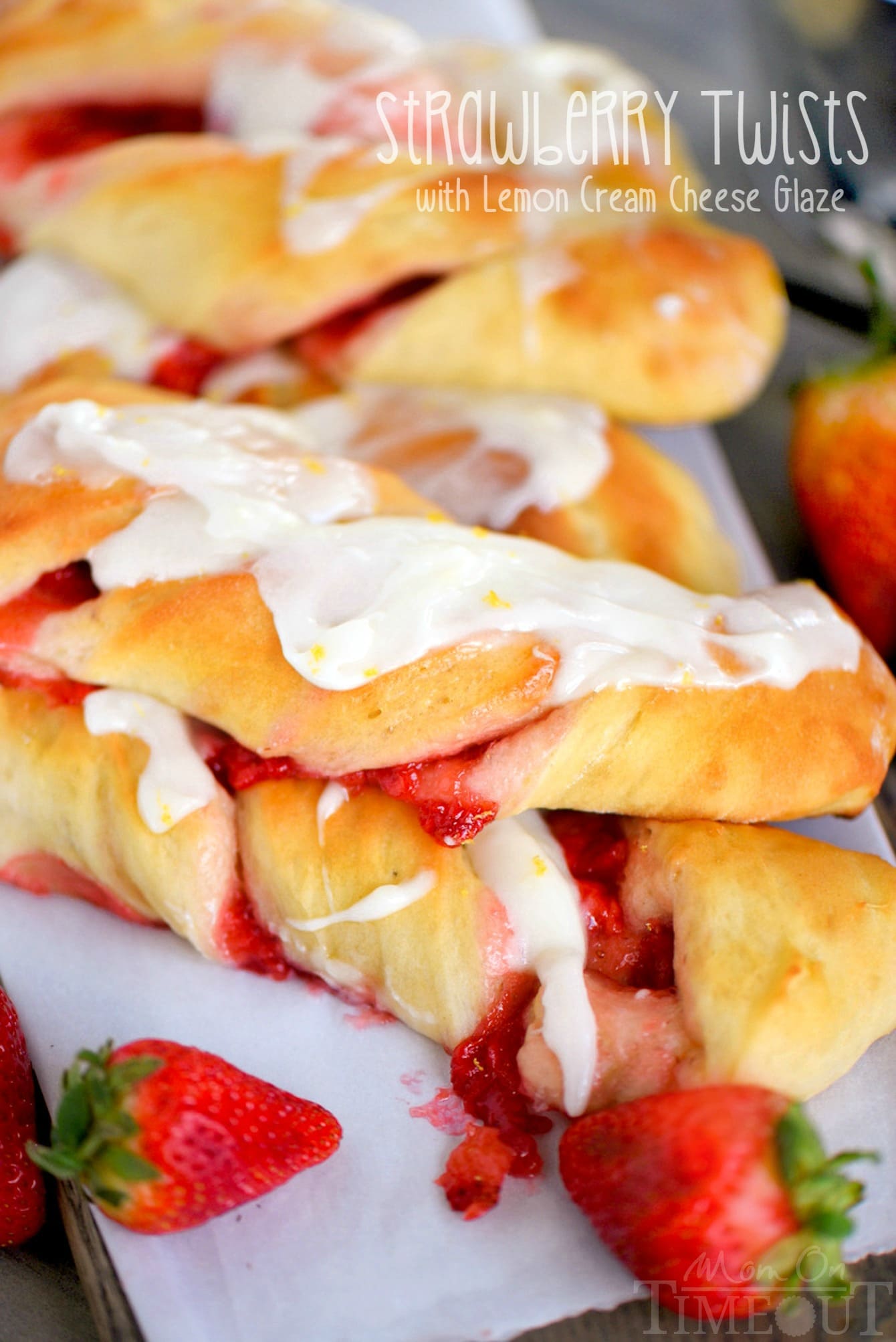 Strawberry Twists with Lemon Cream Cheese Glaze are sure to become your new favorite addition to Sunday brunch! A homemade strawberry filling makes these twists extra special and delicious and the lemon cream cheese glaze is going to knock your socks off! | Mom On Timeout