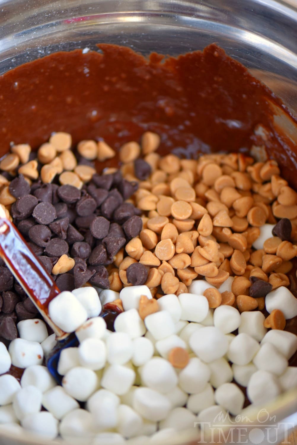 chocolate and peanut butter chips with marshmallows mixed into batter