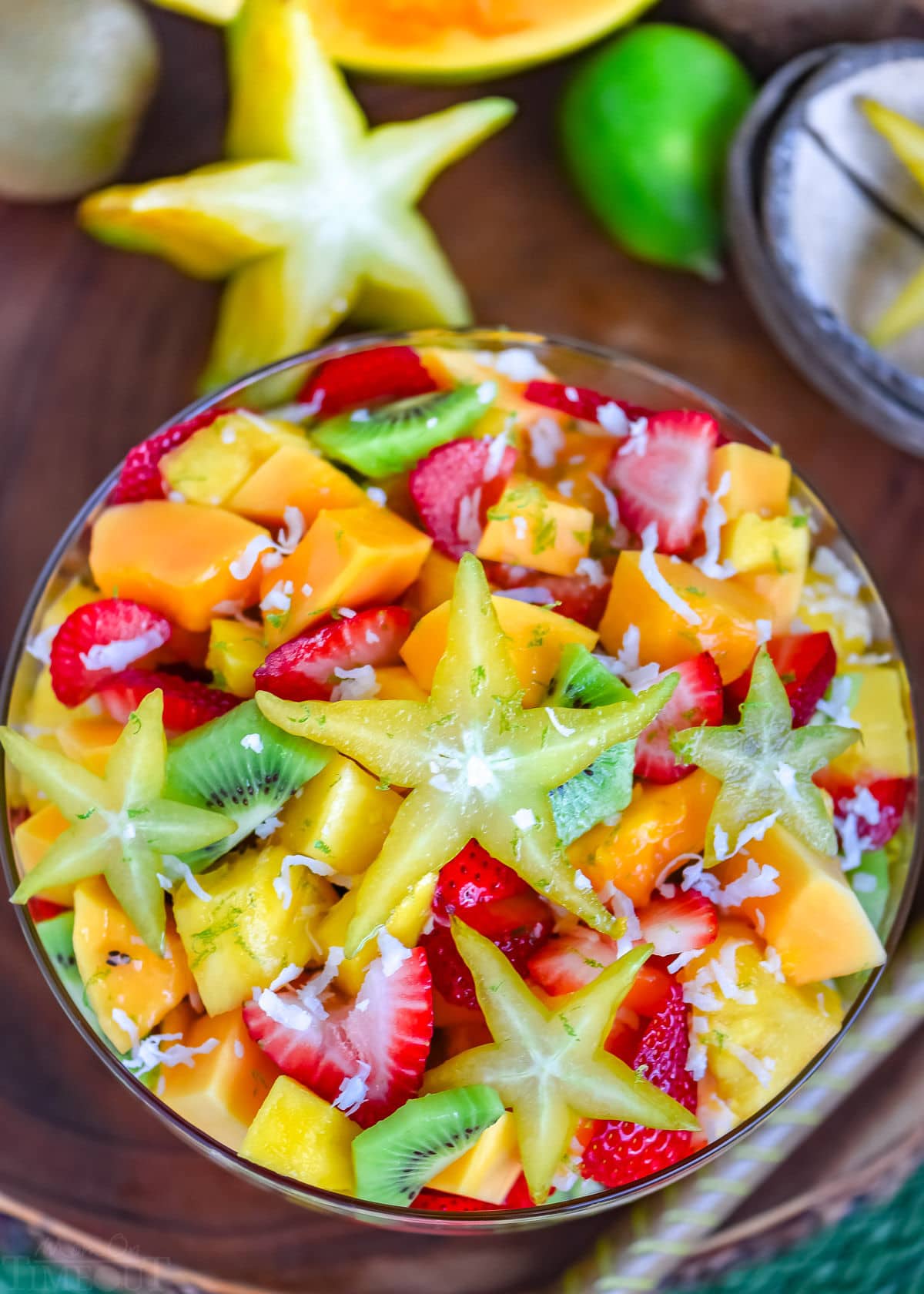 top down look at fruit salad with a star fruit right on top.