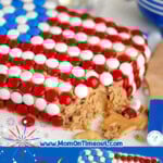 Two image graphic of Chocolate Chip Cookie Dough Flag Dip decorated with red, white and blue MMs. Text overlay at top and bottom of image.