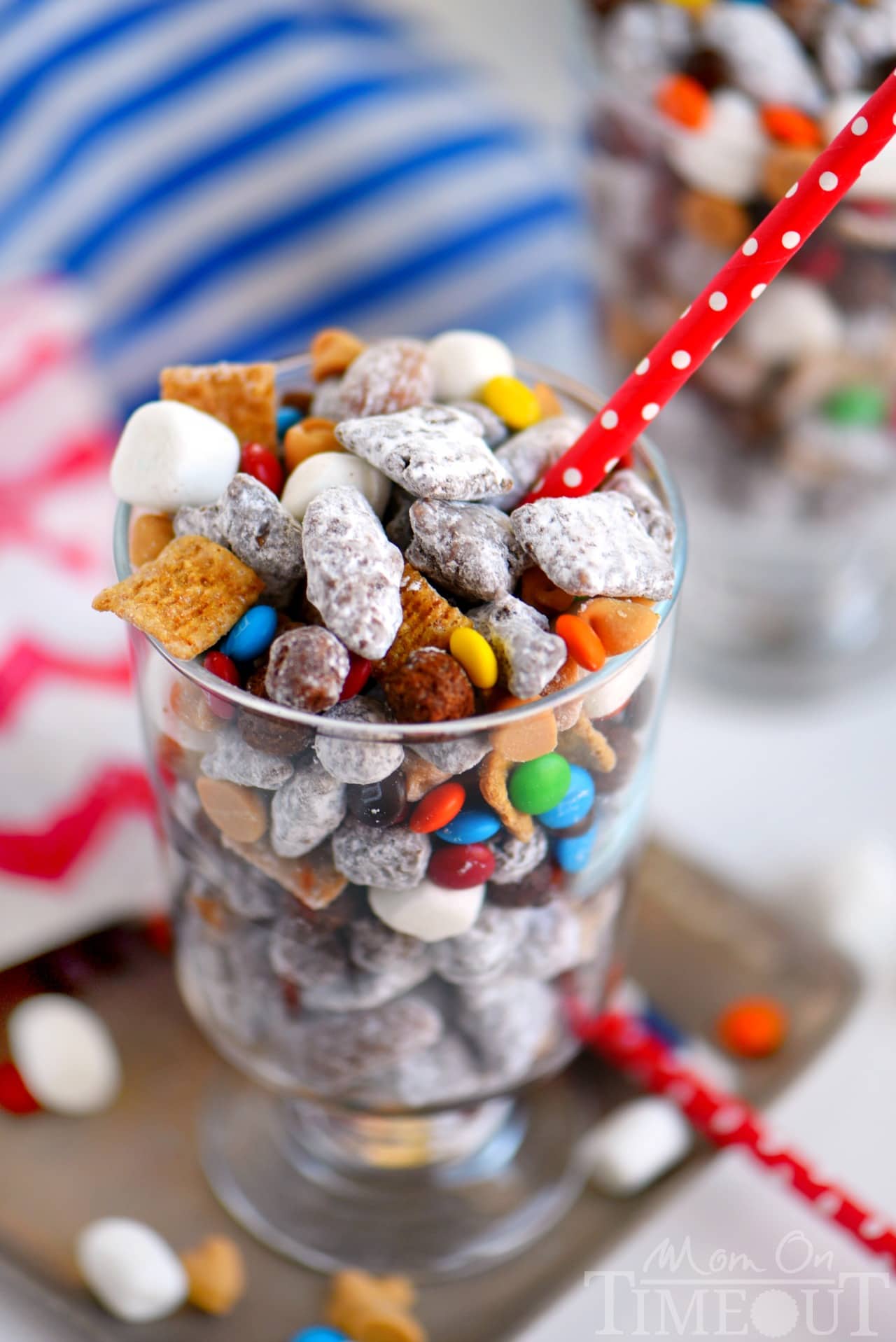 These Monster S'mores Muddy Buddies are the ultimate snack mix! Filled with all sorts of goodies like roasted almonds, peanut butter, and marshmallows - this sweet treat is hard to resist!