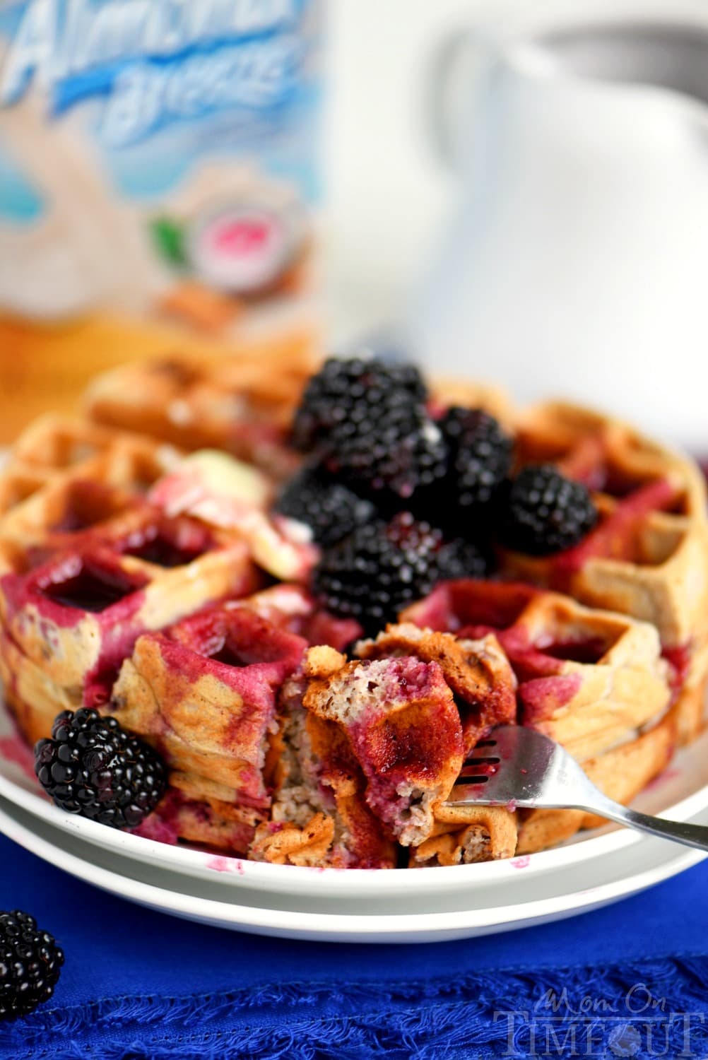 Better-for-you Overnight Blackberry Yeast Waffles with blackberry syrup - breakfast has never looked so good! Five minutes of work the night before delivers the most amazingly delicious waffles the next morning!