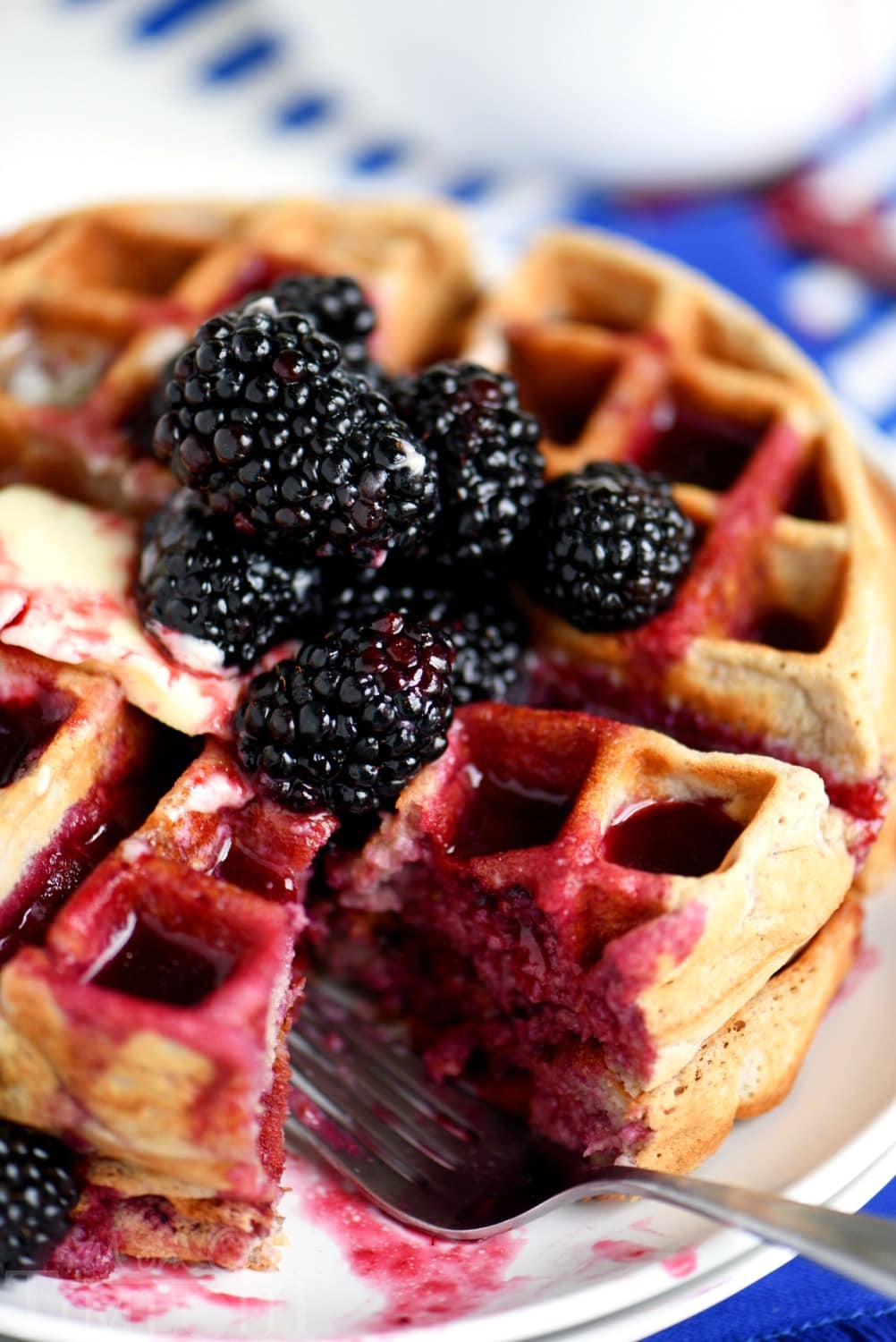 Better-for-you Overnight Blackberry Yeast Waffles with blackberry syrup - breakfast has never looked so good! Five minutes of work the night before delivers the most amazingly delicious waffles the next morning!