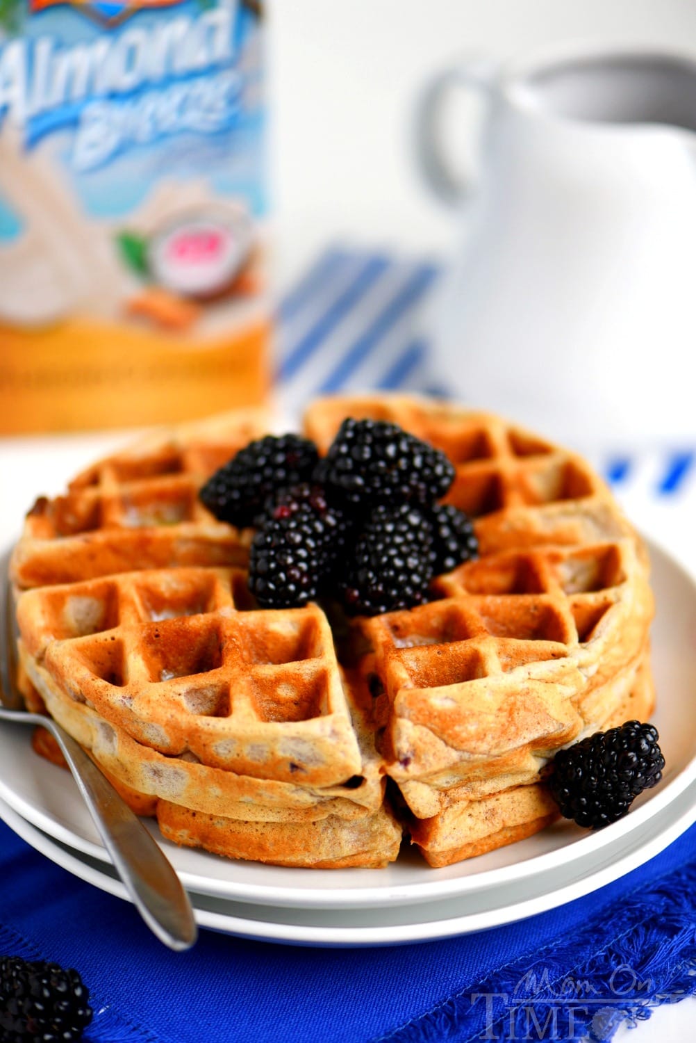 Better-for-you Overnight Blackberry Yeast Waffles with blackberry syrup - breakfast has never looked so good! Five minutes of work the night before delivers the most amazingly delicious waffles the next morning!