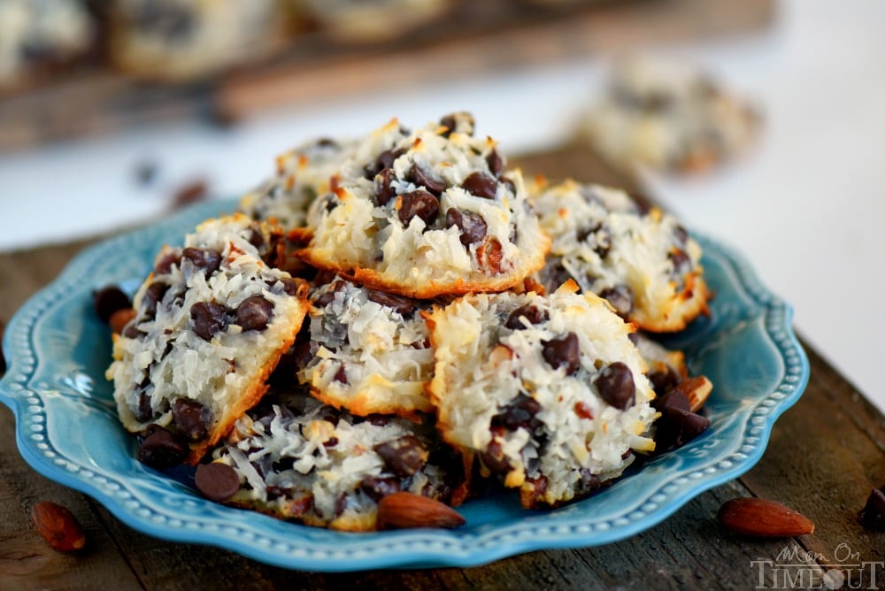 These easy Almond Joy Cookies take just four ingredients and don't even require a mixer! No beating, no chilling, just mix 'em up and throw 'em in the oven EASY! You're going to love these ooey gooey fabulous cookies!