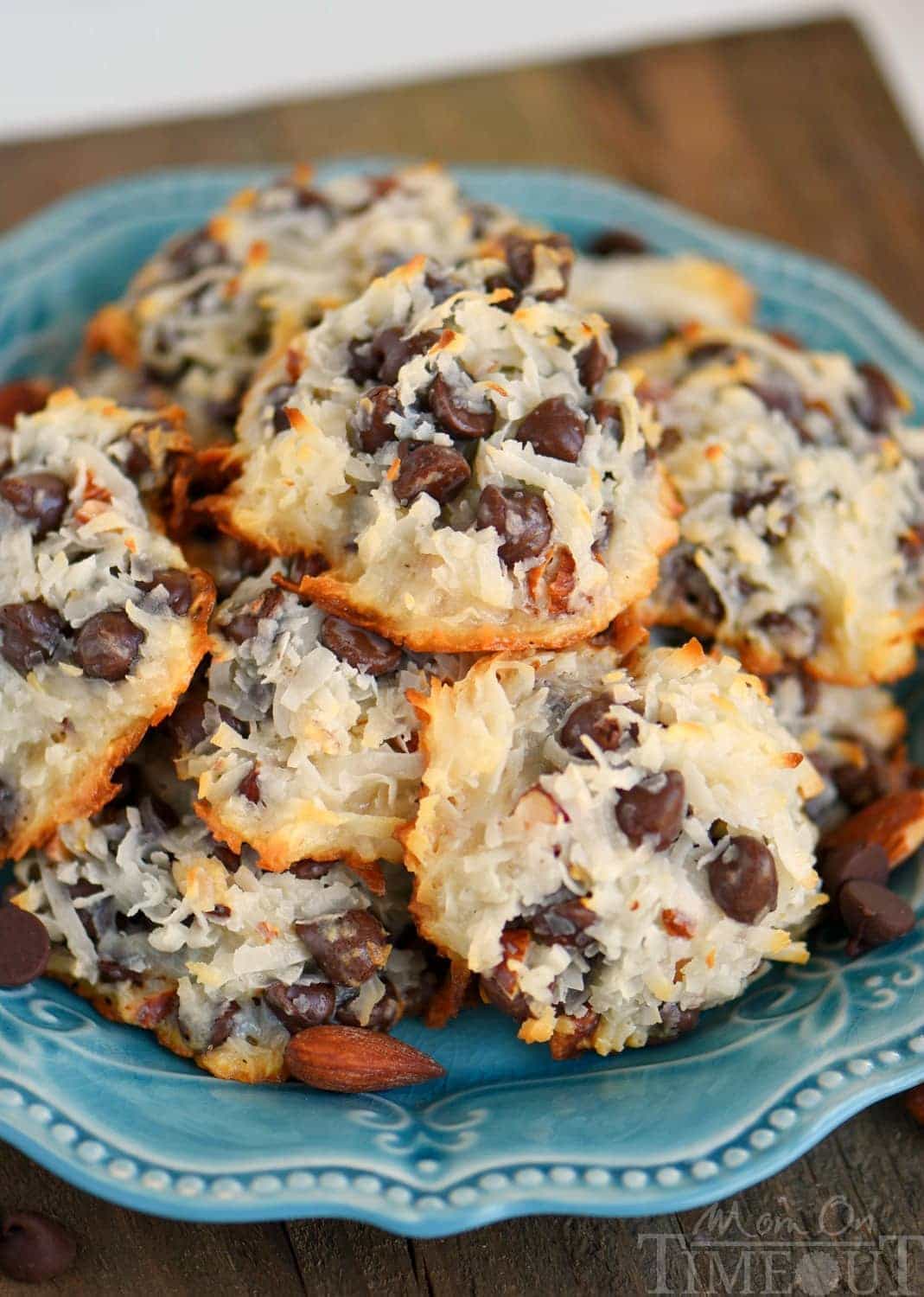 These easy Almond Joy Cookies take just four ingredients and don't even require a mixer! No beating, no chilling, just mix 'em up and throw 'em in the oven EASY! You're going to love these ooey gooey fabulous cookies!