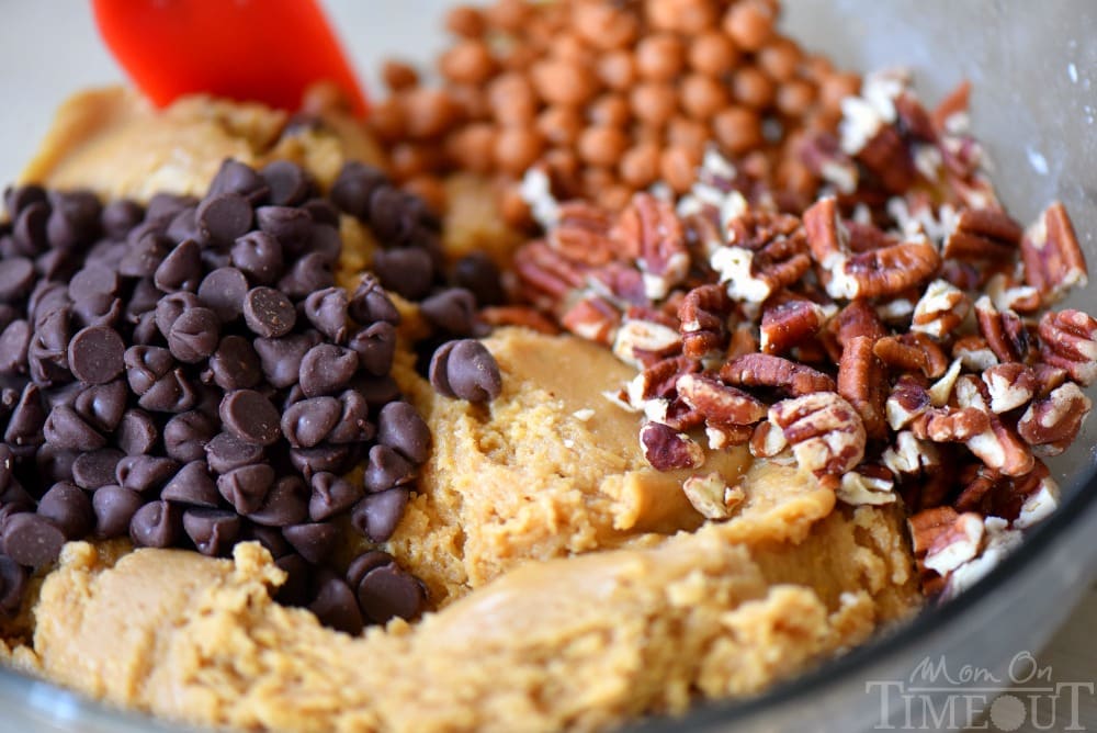 Outrageous Chocolate Chip Turtle Pudding Cookies are loaded with chocolate chips, pecans, and caramel. These giant, bakery style cookies will steal the show! Extra chewy and packed with flavor!