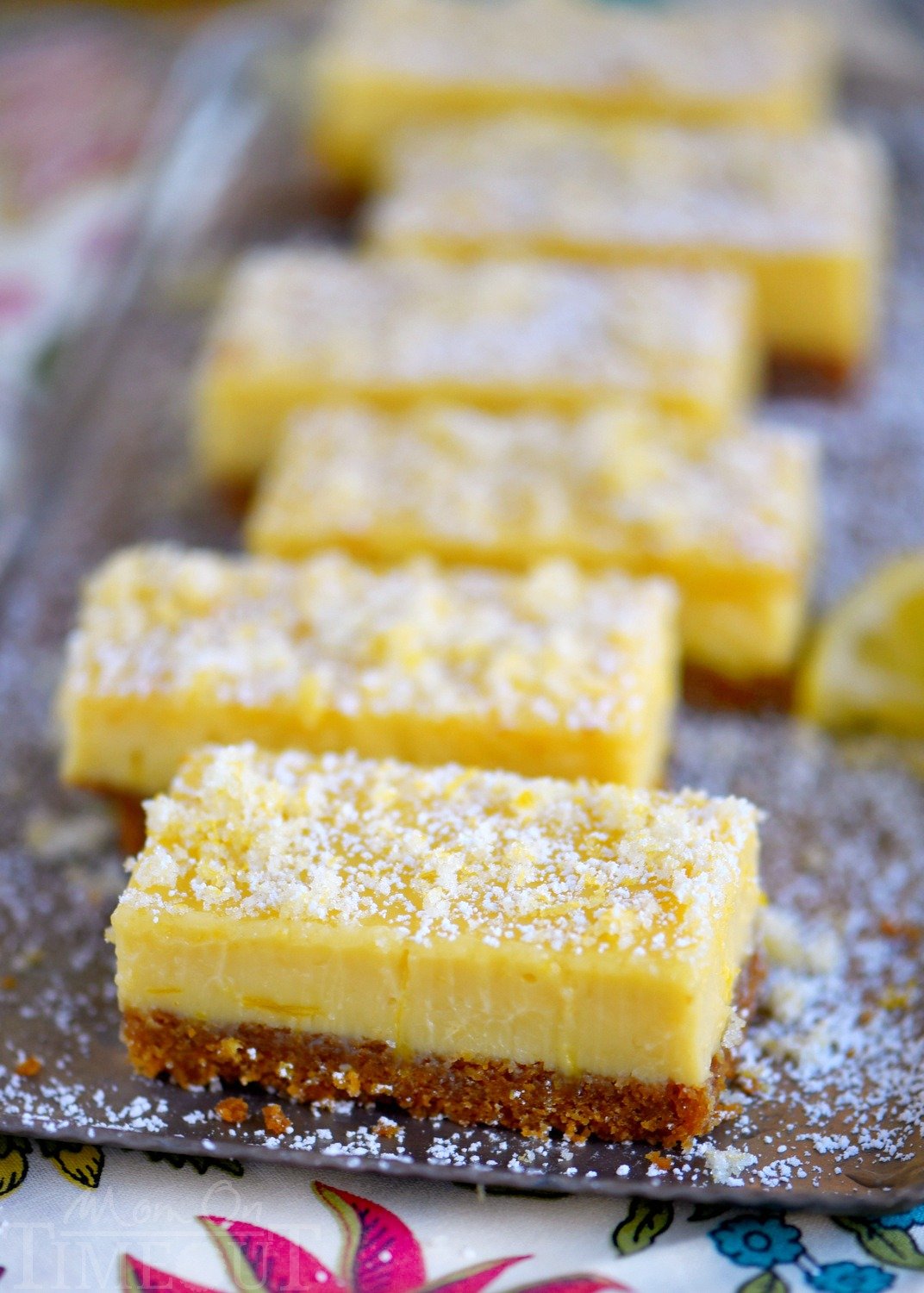 These Lemon Drop Bars are extra creamy and topped with candied lemon zest for the BIGGEST lemon flavor possible! So easy to make, deliciously sweet and tart, you'll find these Lemon Drop Bars hard to resist! 