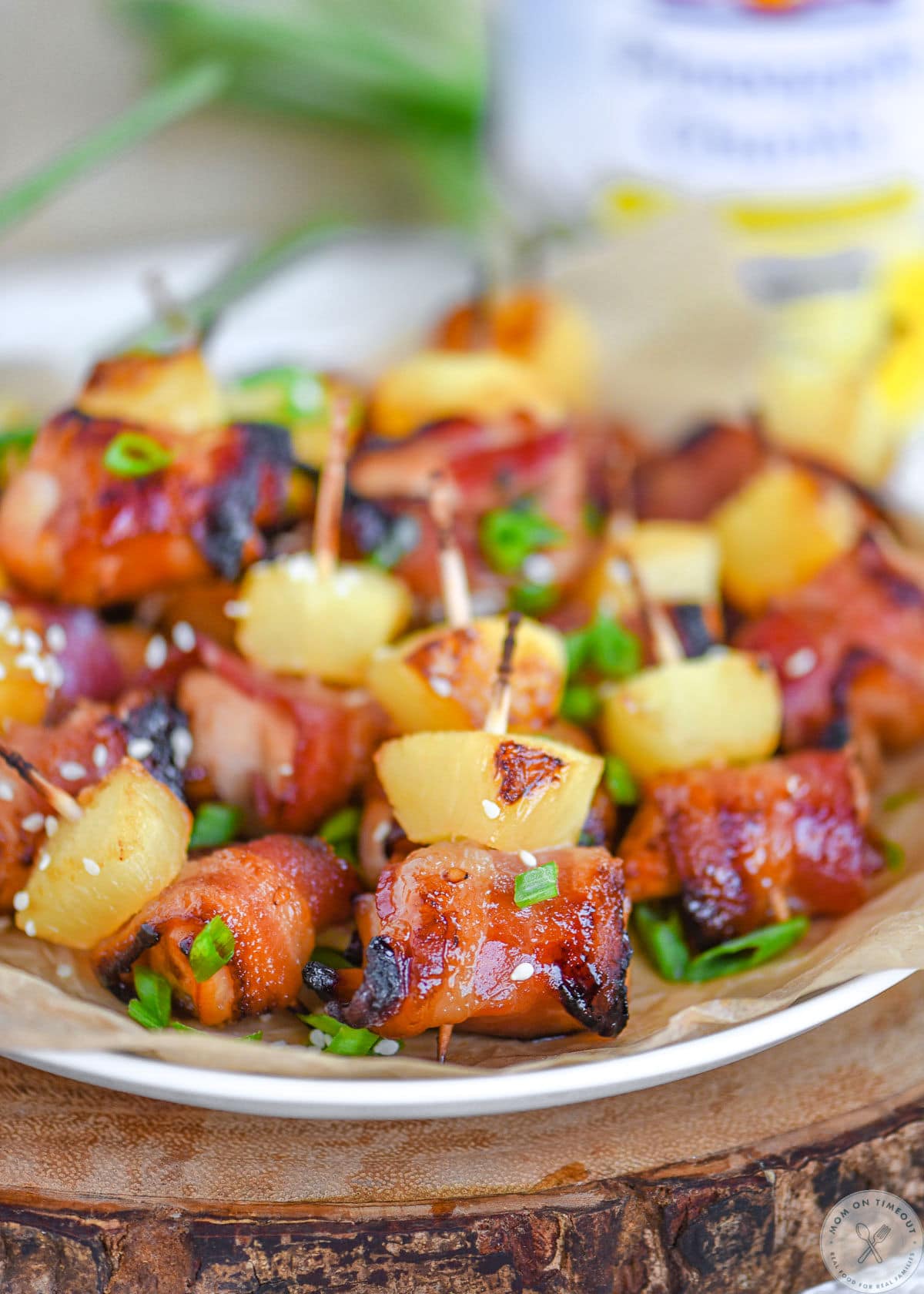 Pulled back shot of plate of chicken teriyaki bites.