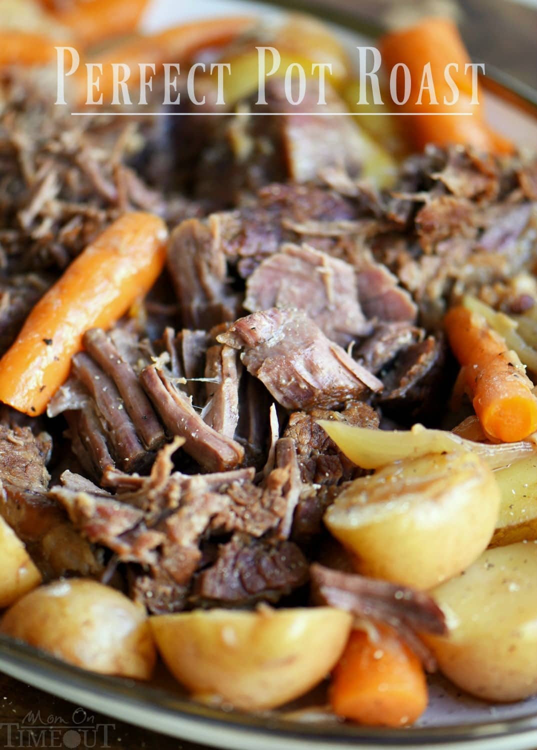 pot roast beef shredded with veggies on platter