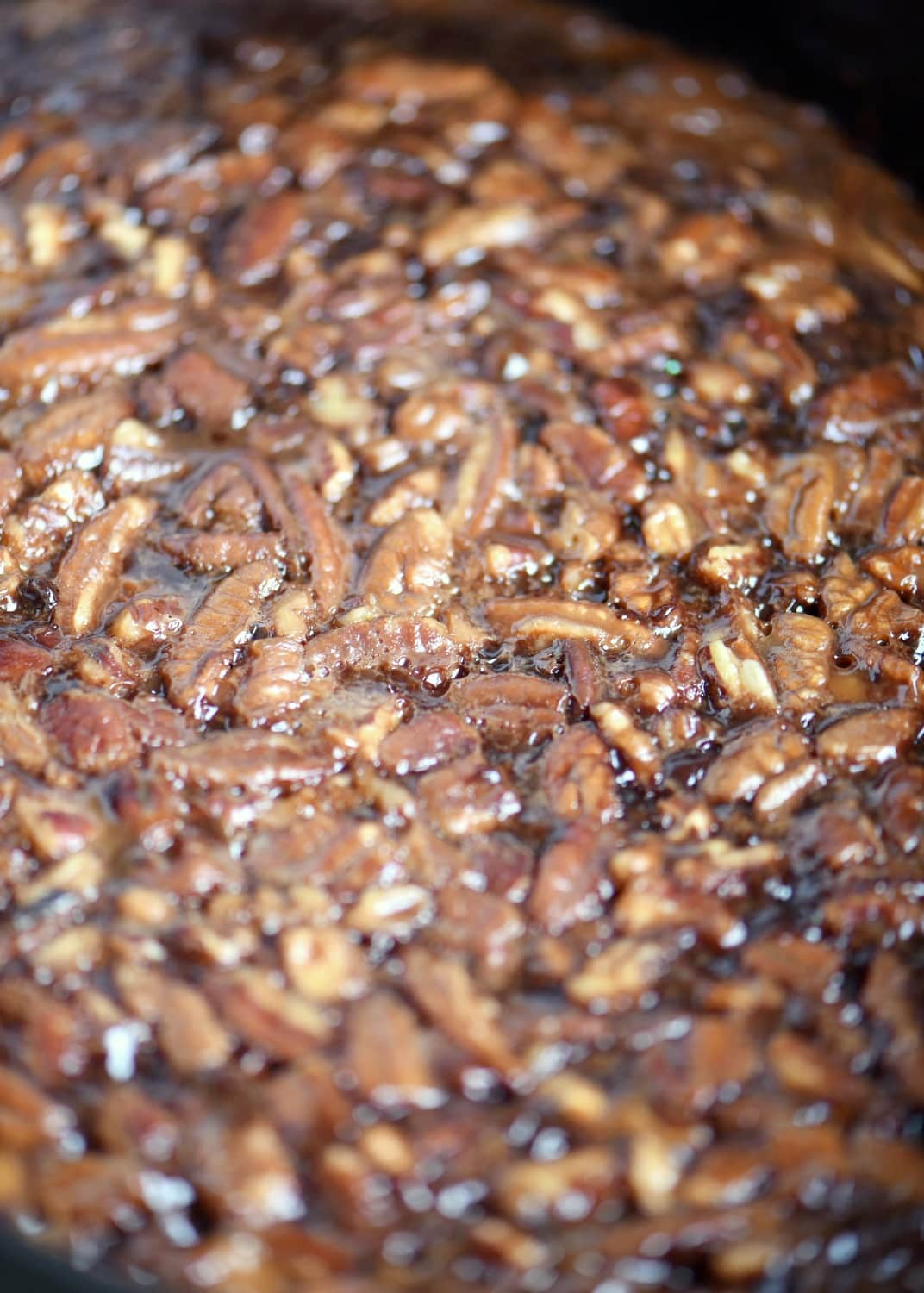 Fabulously gooey and outrageously delicious, these Slow Cooker Hot Fudge Turtle Brownies are going to rock your world! Hot fudge sauce, caramel, pecans, and gooey brownies come together for one irresistible dessert! // Mom On Timeout