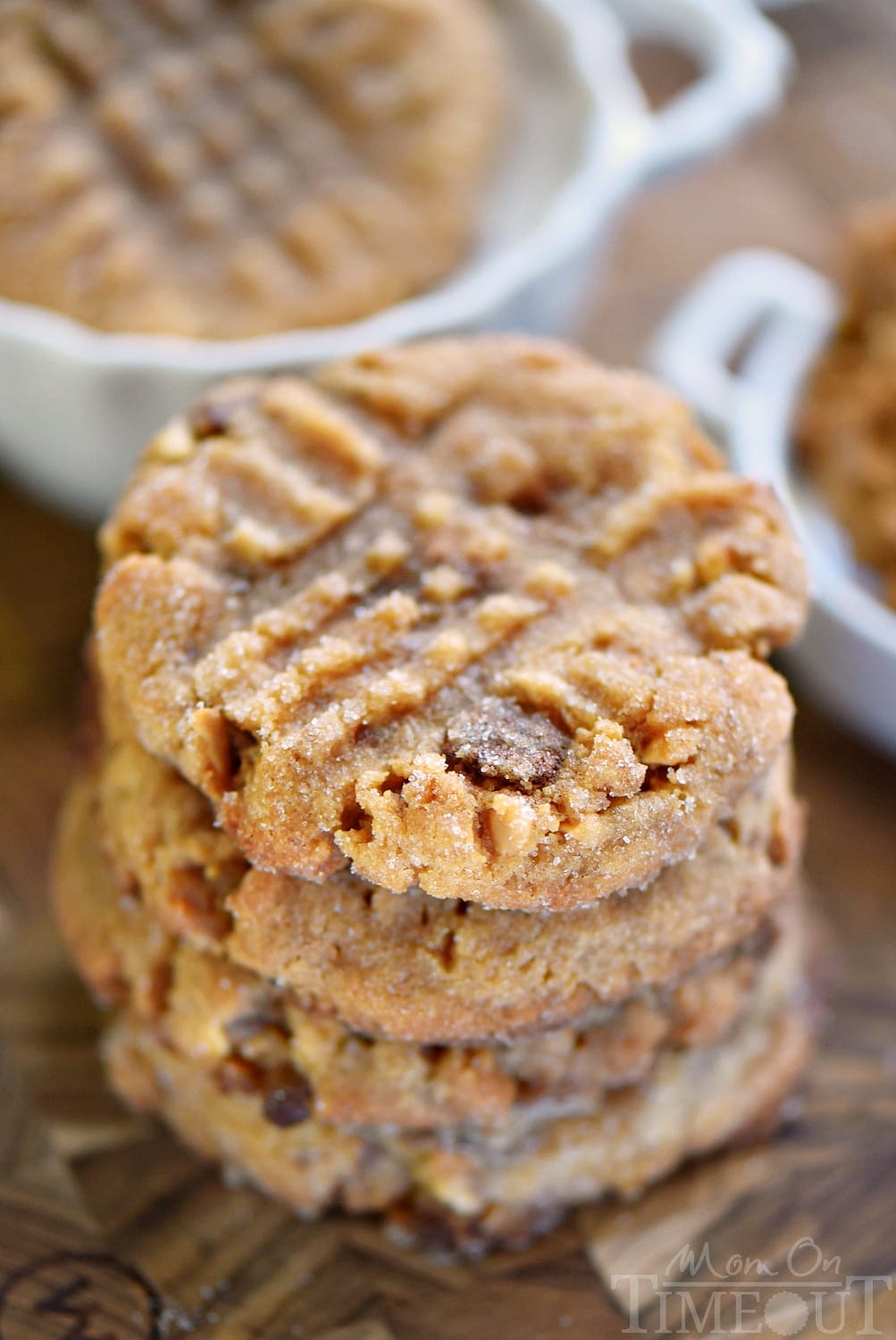 These easy, 5-ingredient Flourless Toffee Peanut Butter Cookies are the most peanut-buttery cookie EVER! The perfect cookie for peanut butter lovers! Serve with an ice cold glass of milk for extreme satisfaction! // Mom On Timeout