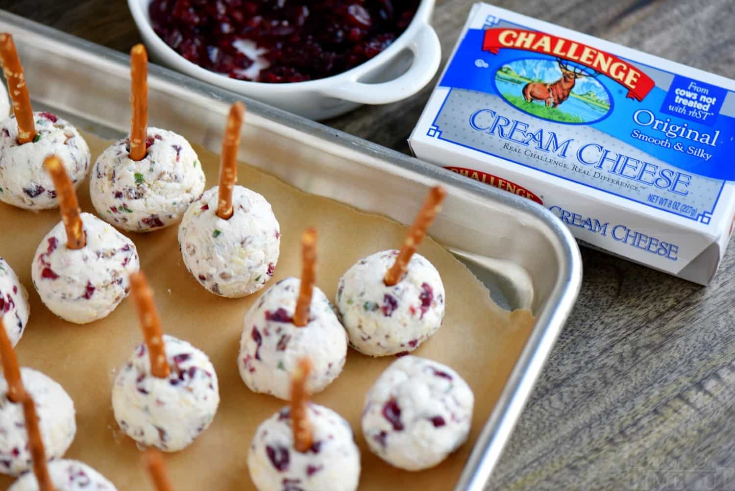 Holiday entertaining has never been easier and more delicious with these Cranberry Pecan Mini Goat Cheese Balls! So easy to make and gorgeous too! Perfect for Thanksgiving, Christmas, and New Year's! (Can be made in advance!) // Mom On Timeout