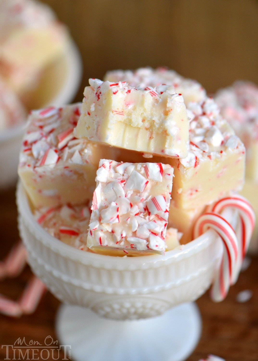 Tis the season for peppermint and sweets! You can have the best of both with this Practically Perfect Peppermint Fudge! Just a handful of ingredients and five minutes are all you need to make this pretty and festive fudge! // Mom On Timeout