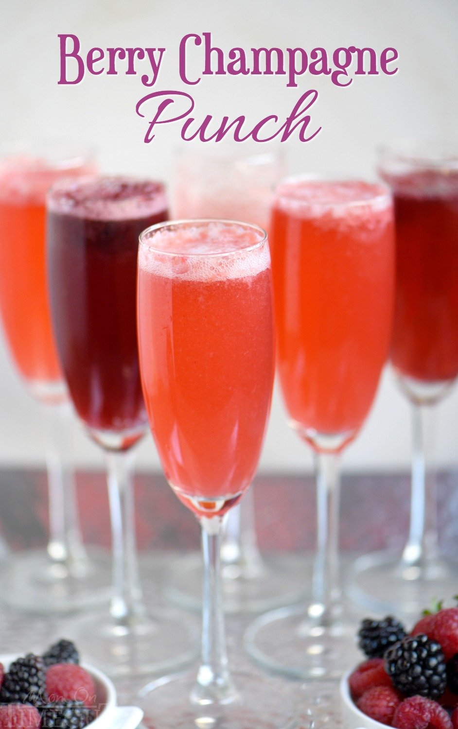 This Berry Champagne Punch is the perfect way to kick off New Year's Eve! This punch is super easy to prepare and is made with fresh berries and champagne or sparkling wine. Perfect for Valentine's Day, Easter brunch and Mother's Day too! // Mom On Timeout