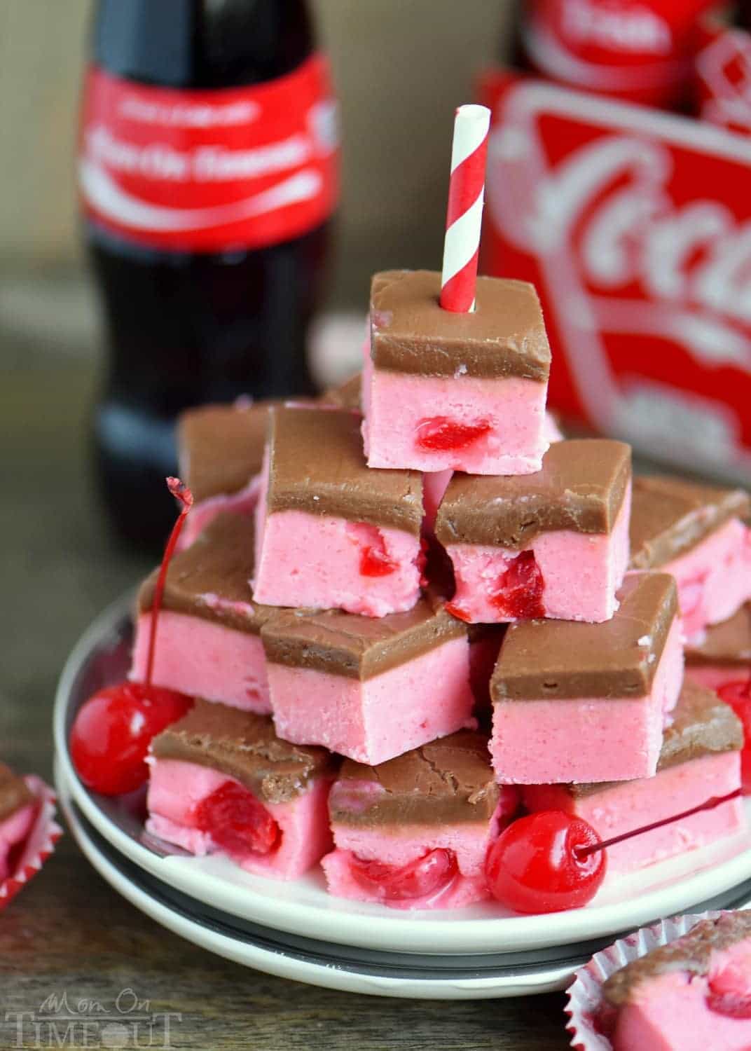 Because we can... Cherry Coke Fudge! A decadent cherry fudge topped with a Coca-Cola chocolate frosting! This irresistible fudge is sure to be a hit this holiday season! // Mom On Timeout