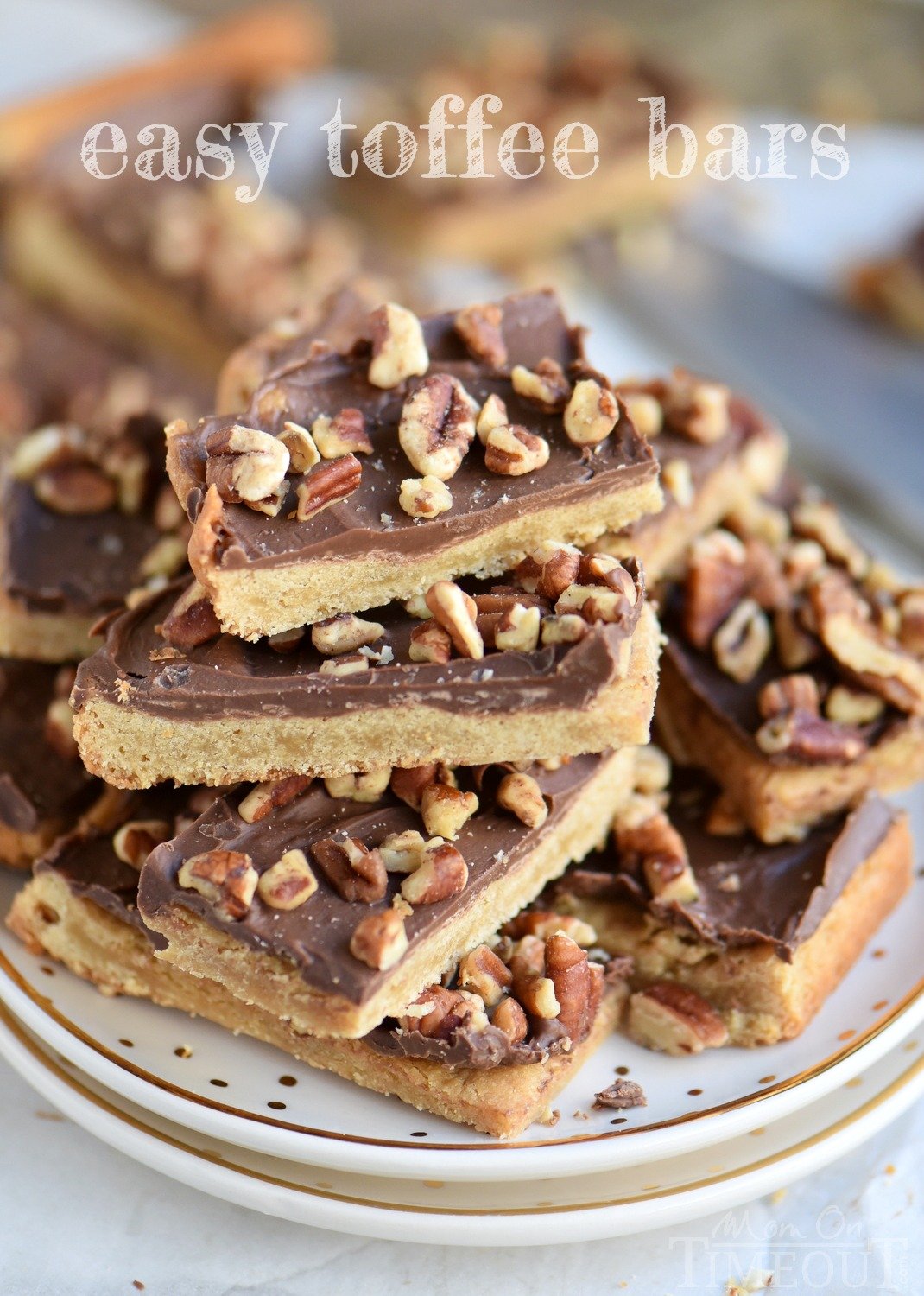 You’re going to go crazy for these Easy Toffee Bars! Simply delicious cookie bars topped with milk chocolate and pecans! Just fantastic! // Mom On Timeout