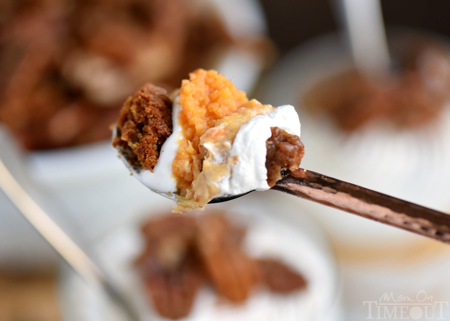 bite of sweet potato parfaits on small spoon