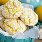 lemon cookies in small green basket lined with parchment