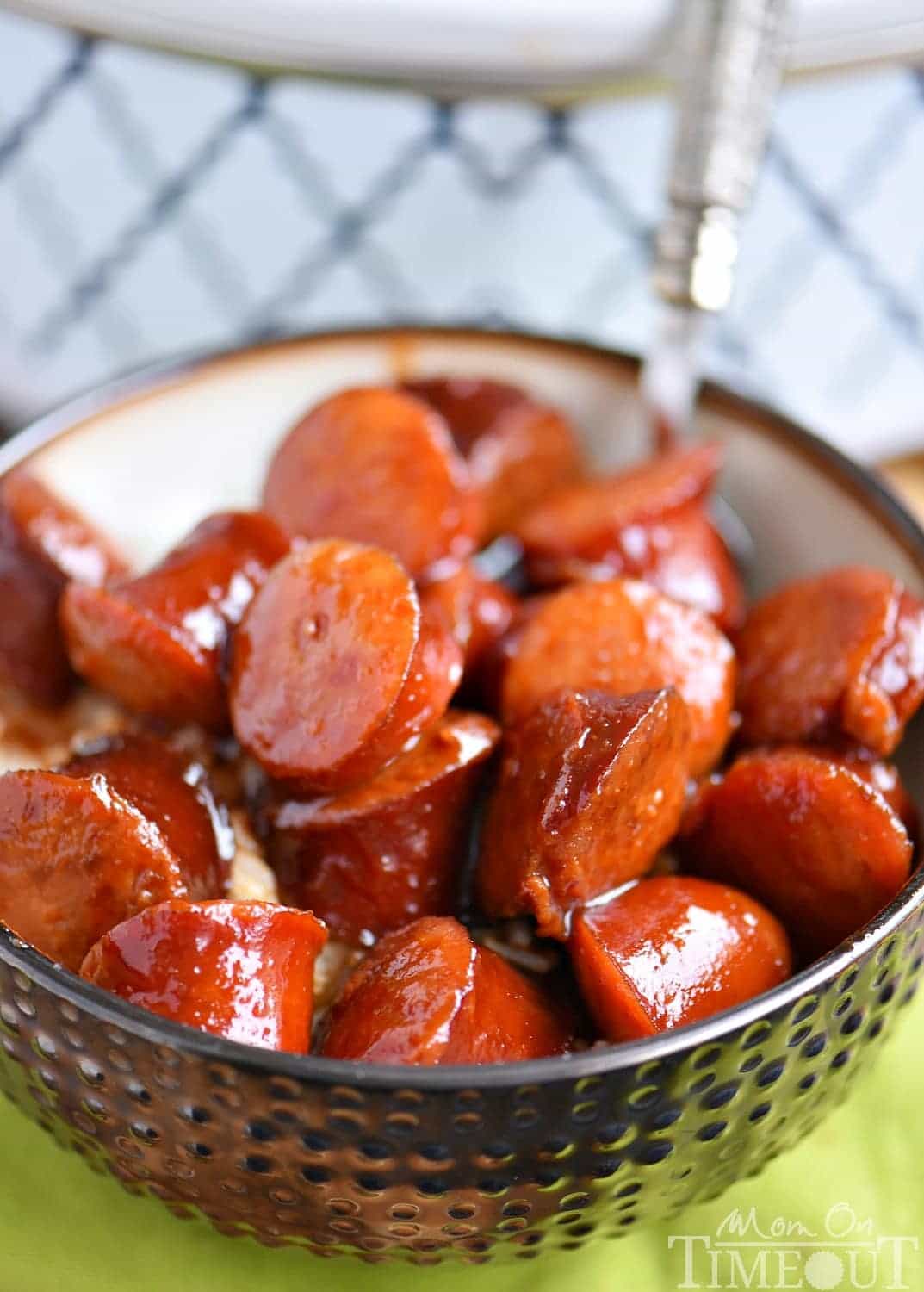 The best appetizer ever! These Slow Cooker Kielbasa Bites are so easy to make and are guaranteed to be a hit at your next party! Great over rice for dinner too! // Mom On Timeout