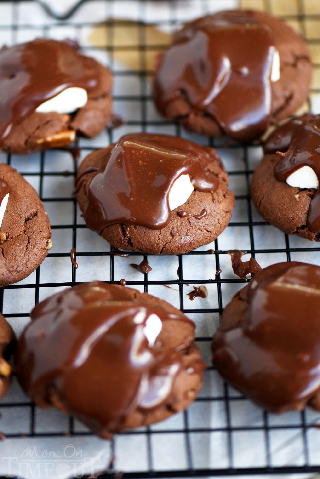 Today is the perfect day to indulge in these Chocolate Peanut Butter Marshmallow Clouds! The most incredible chocolate cookies you've ever had topped with a marshmallow cloud and decadent chocolate frosting! It's impossible to say no to these glorious treats! // Mom On Timeout