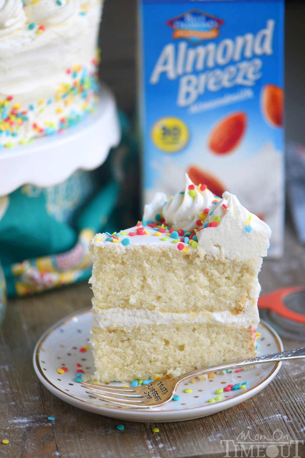 This Very Vanilla Cake is bursting with sweet vanilla flavor! Top with fresh fruit, sprinkles or white chocolate curls for a beautiful finish! Can be made dairy-free too! // Mom On Timeout