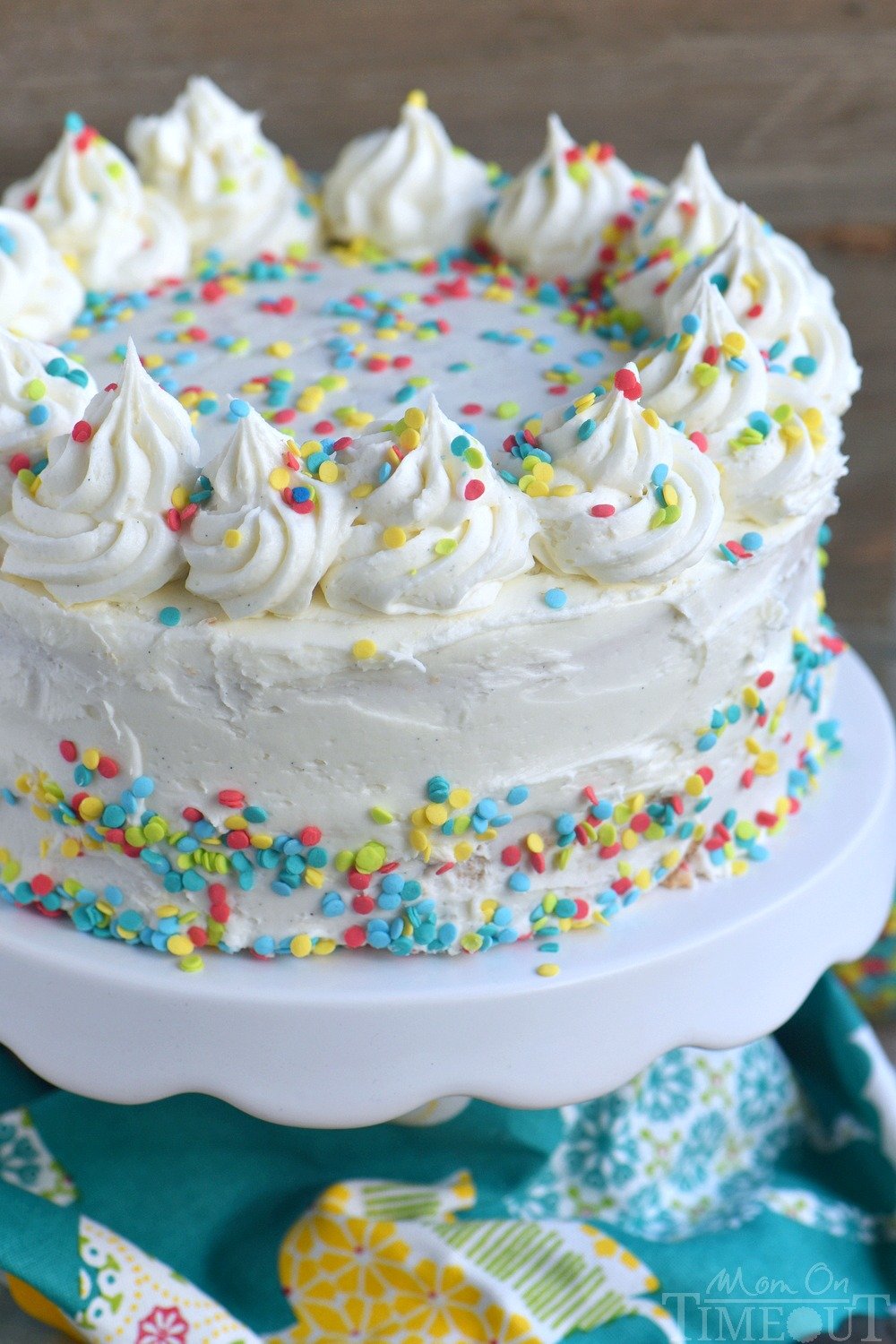 This Very Vanilla Cake is bursting with sweet vanilla flavor! Top with fresh fruit, sprinkles or white chocolate curls for a beautiful finish! Can be made dairy-free too! // Mom On Timeout