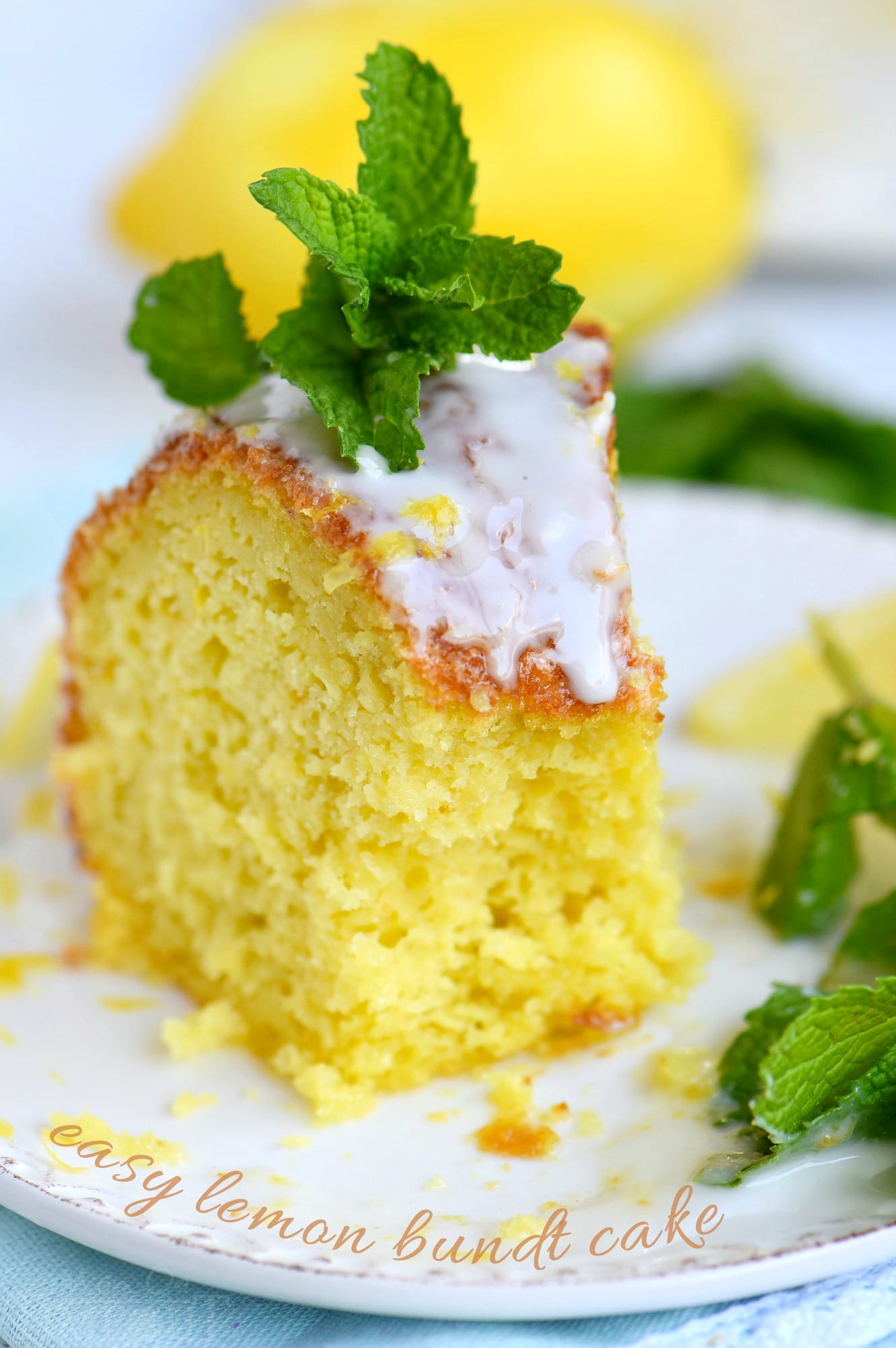 Looking for an easy lemon dessert recipe that is going to WOW your friends and family? This Easy Lemon Bundt Cake is the answer! A breeze to make and loaded with bright lemon flavor, this easy cake recipe is also figure-friendly which makes it perfect for summer! // Mom On Timeout