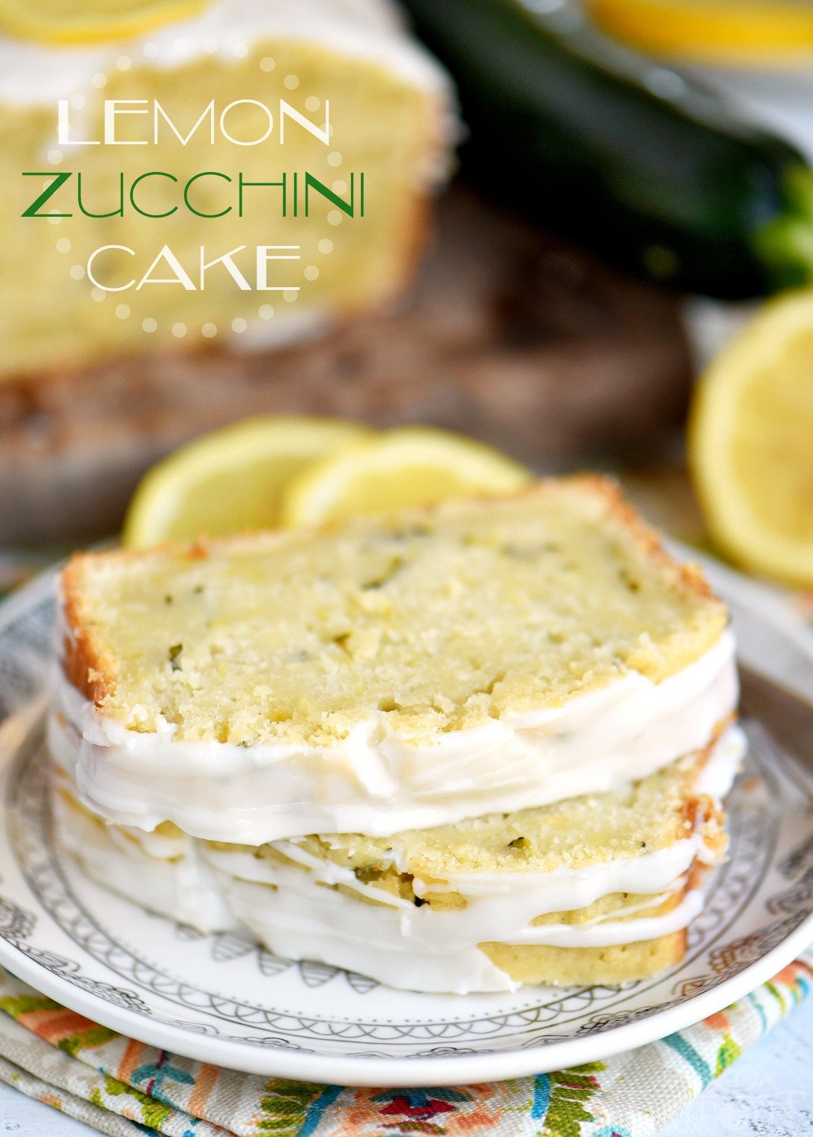 This Lemon Zucchini Cake is definitive proof that lemon and zucchini belong together! Beautifully moist and undeniably delicious, this easy cake is topped with a lemon glaze that will keep you coming back for one more slice.  An excellent way to use up that zucchini from your garden! // Mom On Timeout