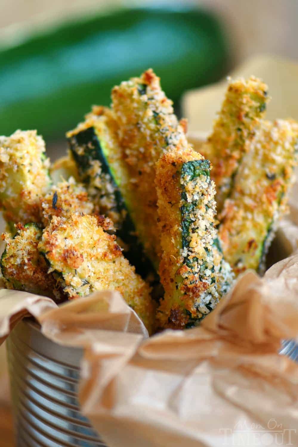 Your new favorite way to eat zucchini! These Baked Parmesan Zucchini Fries are loaded with flavor and baked to golden perfection! The perfect way to use up your summer bounty! // Mom On Timeout
