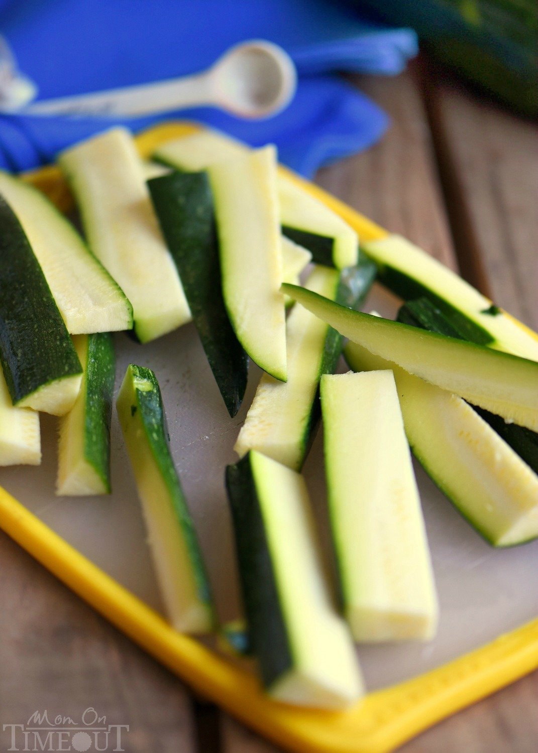 Your new favorite way to eat zucchini! These Baked Parmesan Zucchini Fries are loaded with flavor and baked to golden perfection! The perfect way to use up your summer bounty! // Mom On Timeout