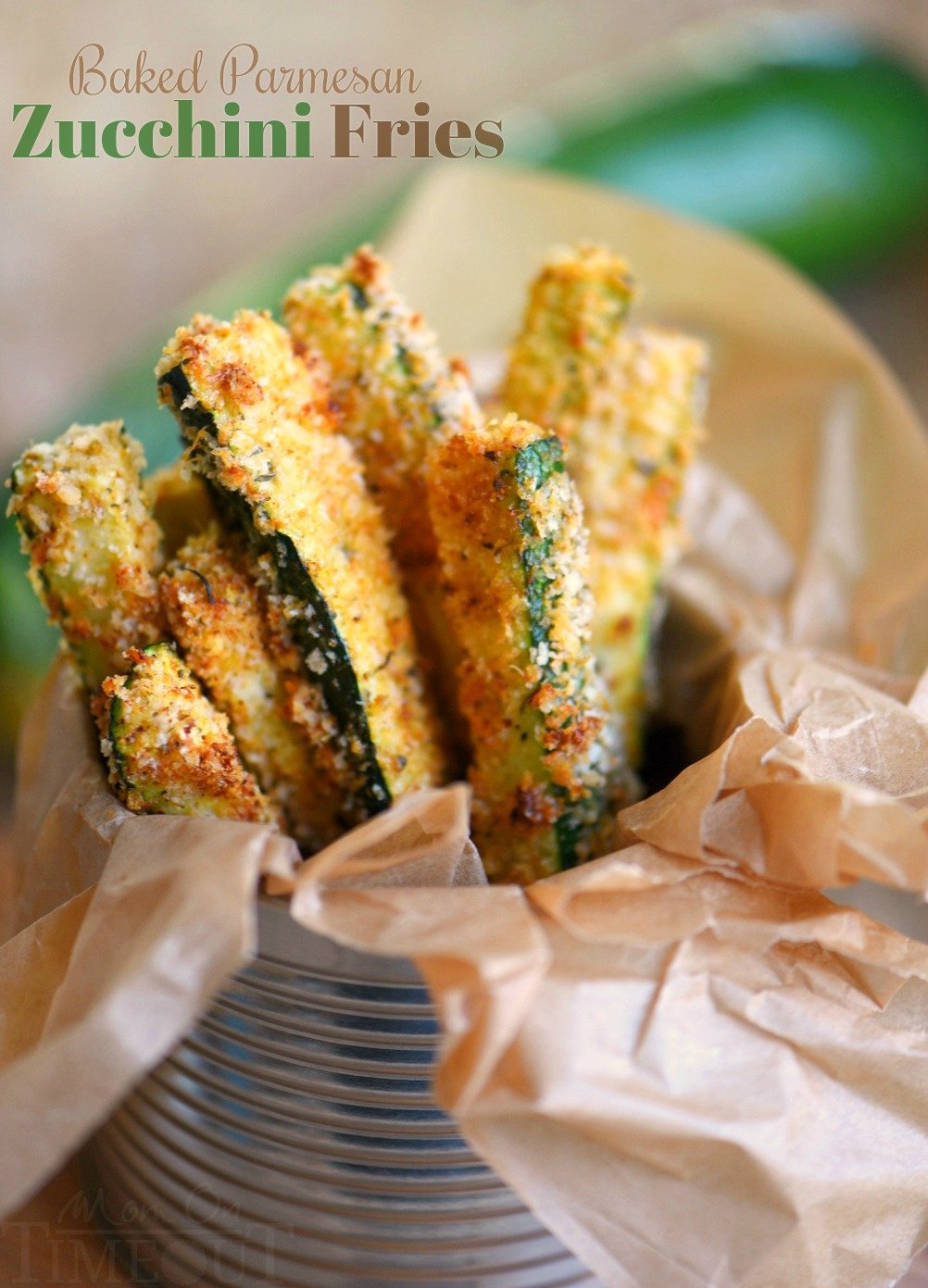 Your new favorite way to eat zucchini! These Baked Parmesan Zucchini Fries are loaded with flavor and baked to golden perfection! The perfect way to use up your summer bounty! // Mom On Timeout