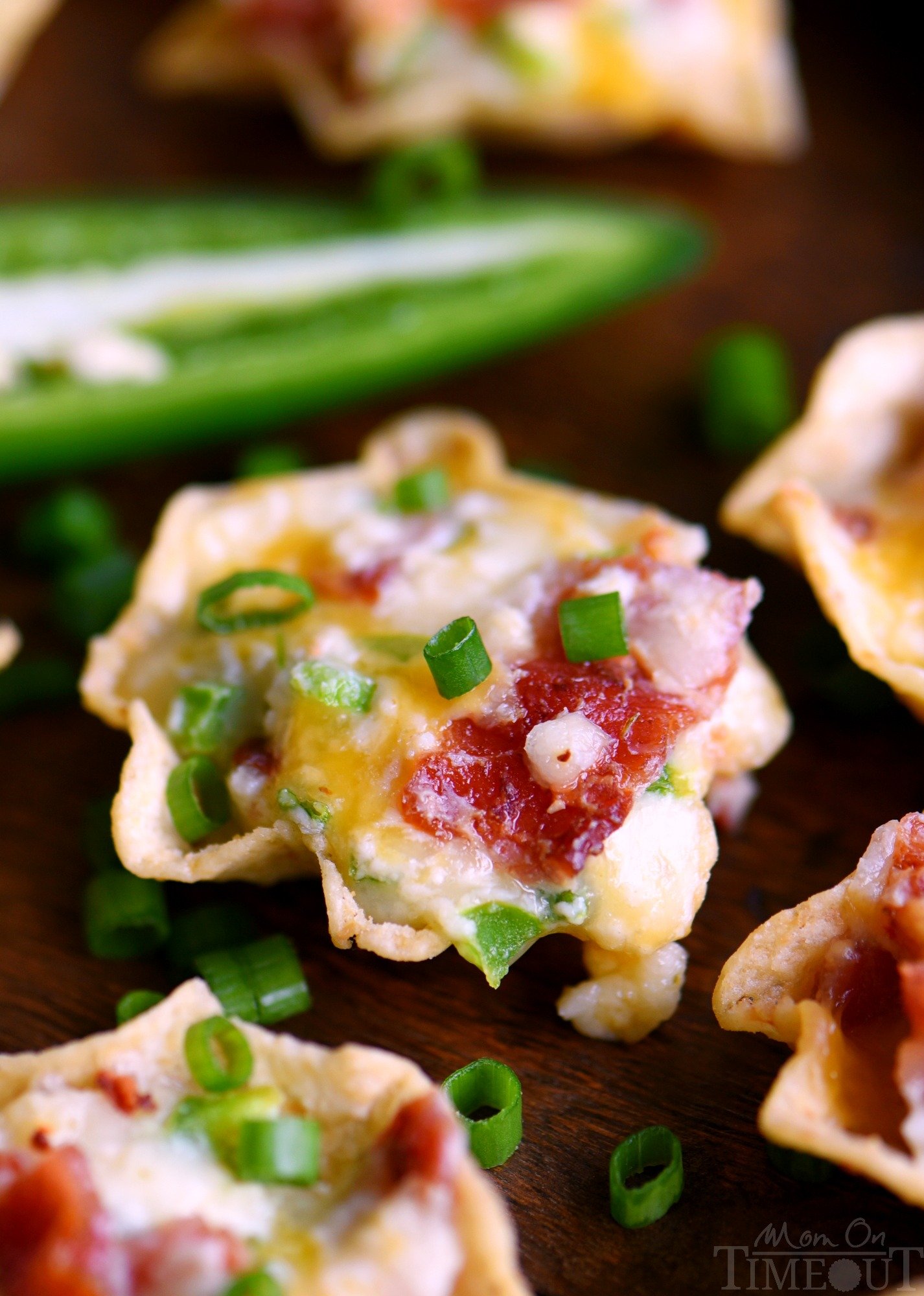 Bacon Jalapeño Popper Bites are the ULTIMATE appetizer! Cheesy, creamy, spicy, bite-sized and did I mention loaded with bacon?? Sure to be the hit of your next party! 