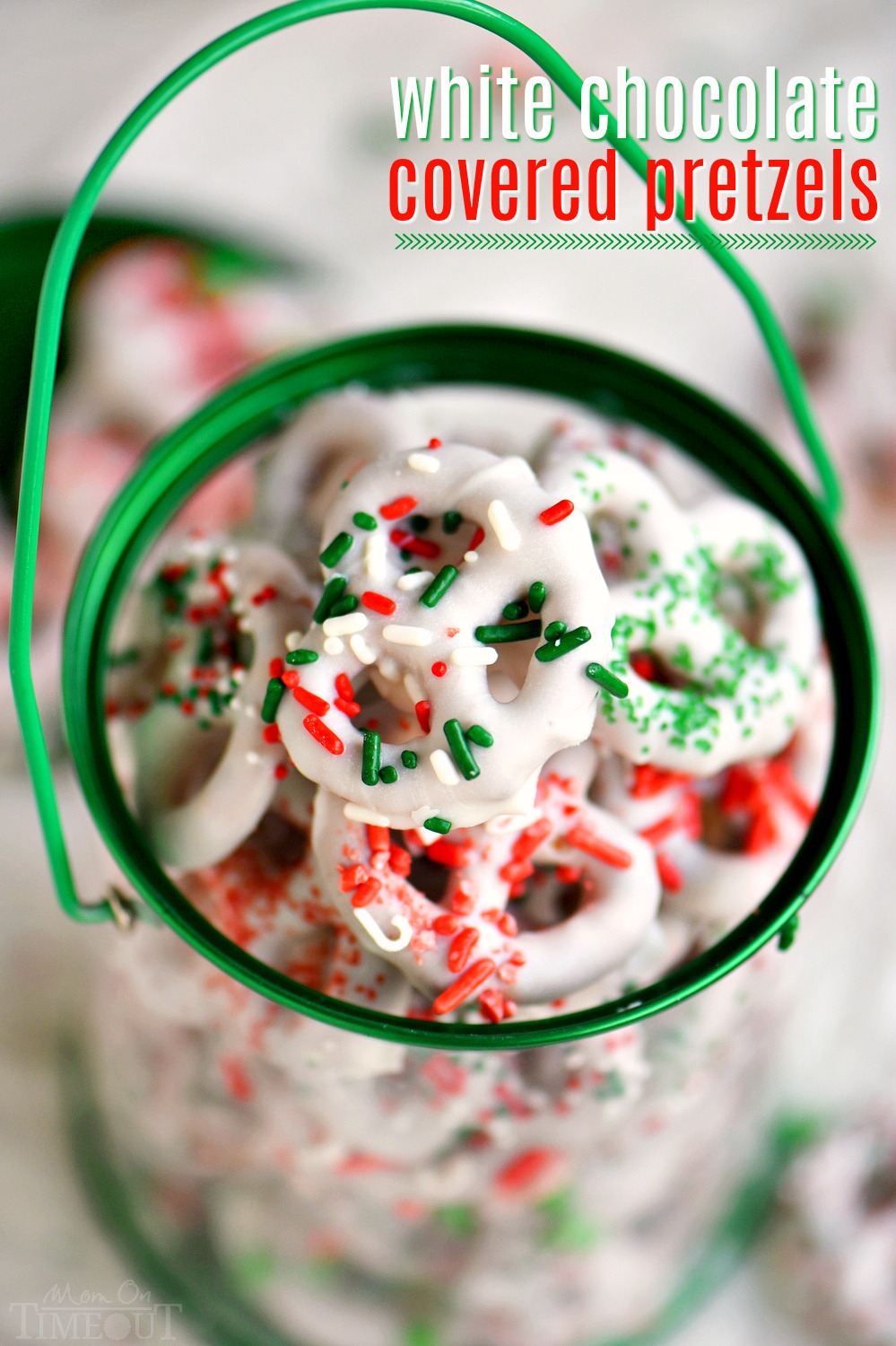 Step by step instructions for the perfect easy White Chocolate Covered Pretzels! Learn how to get perfectly dipped pretzels every time! Decorate with your favorite sprinkles and candies for a holiday treat everyone will love! // Mom On Timeout