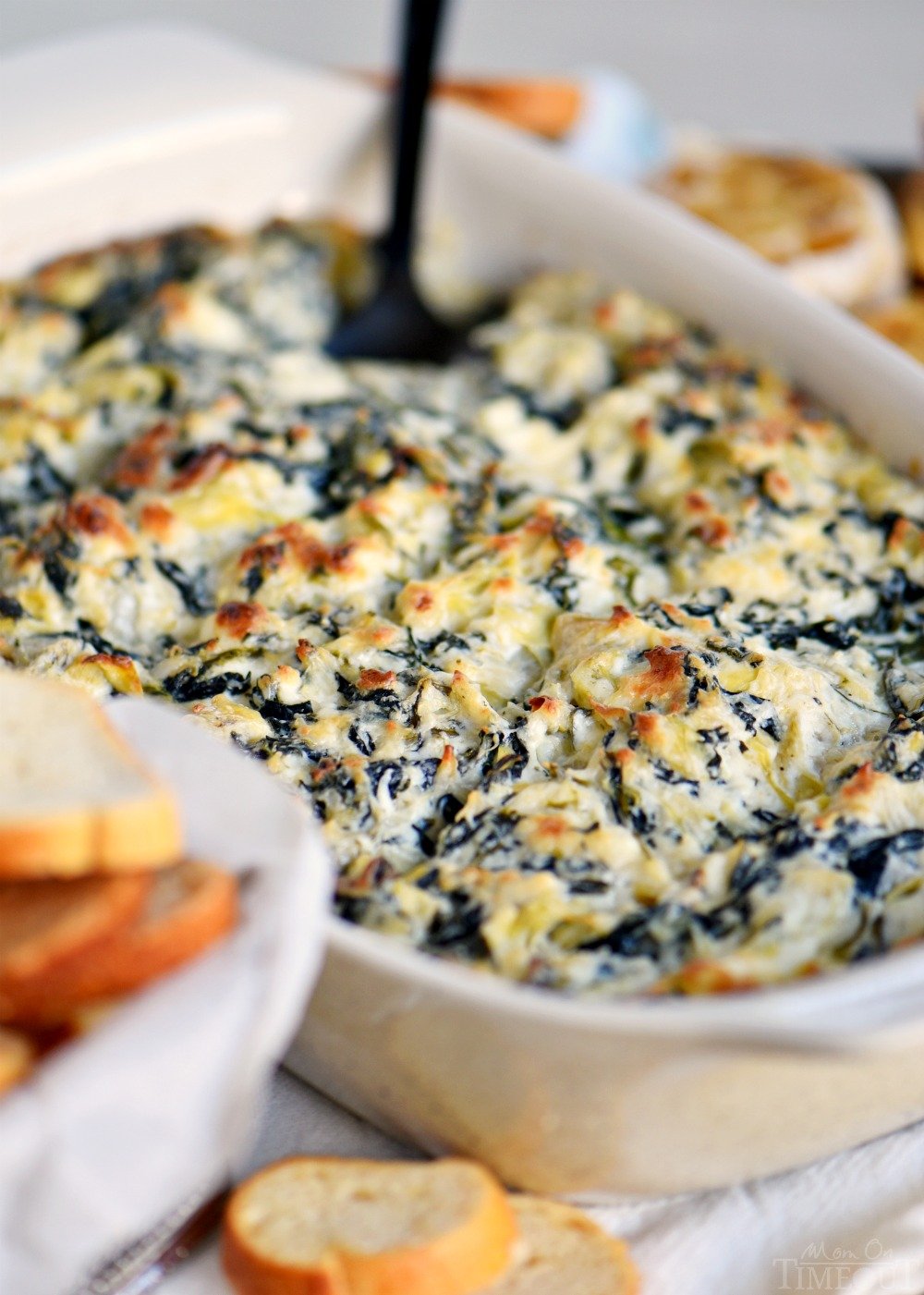 best-spinach-artichoke-dip-in-dish-with-spoon