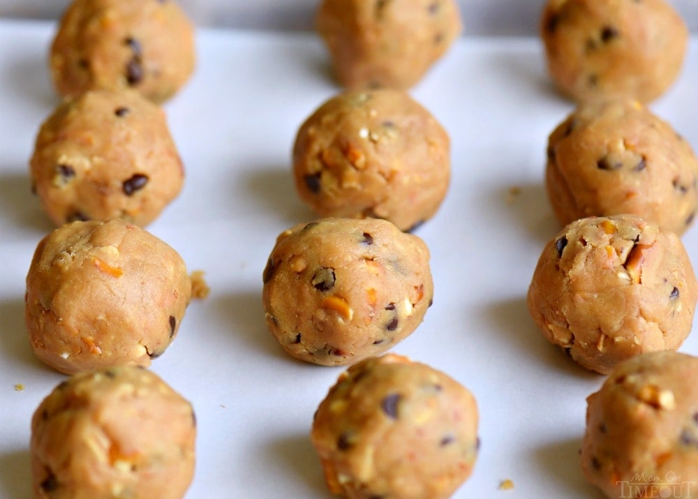 peanut butter balls on baking sheet