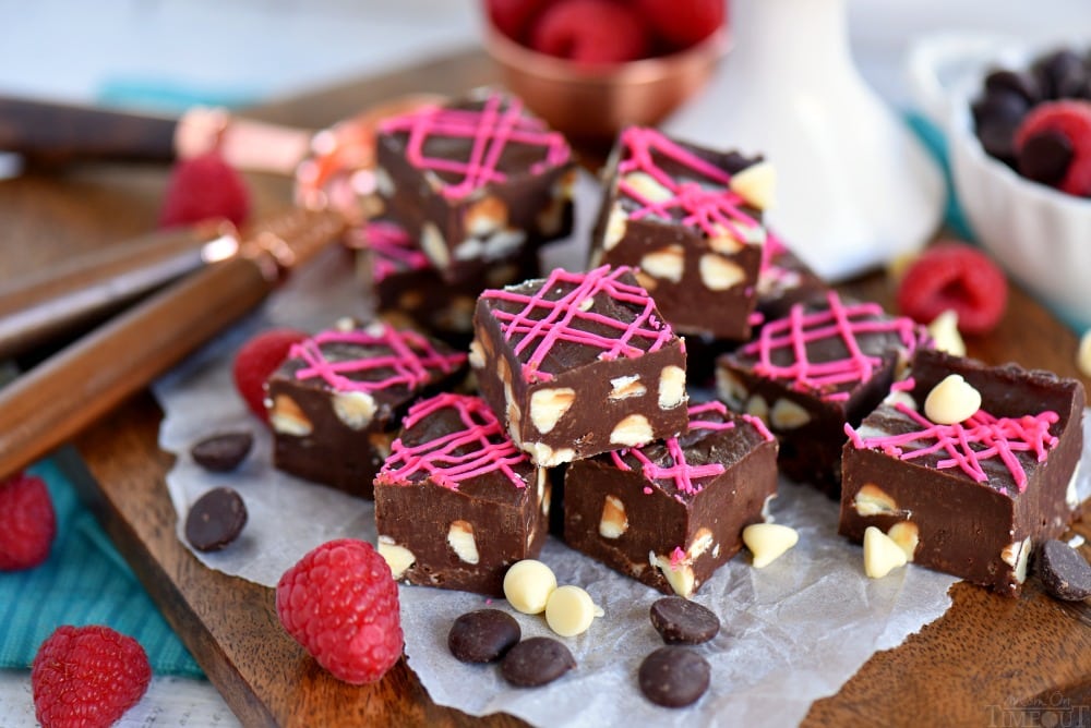 Fudge doesn’t get better or easier than this Dark Chocolate Raspberry Fudge. It’s the perfect quick treat for any occasion! Incredibly decadent and gorgeous to boot this easy fudge recipe takes just 5 minutes to make! 