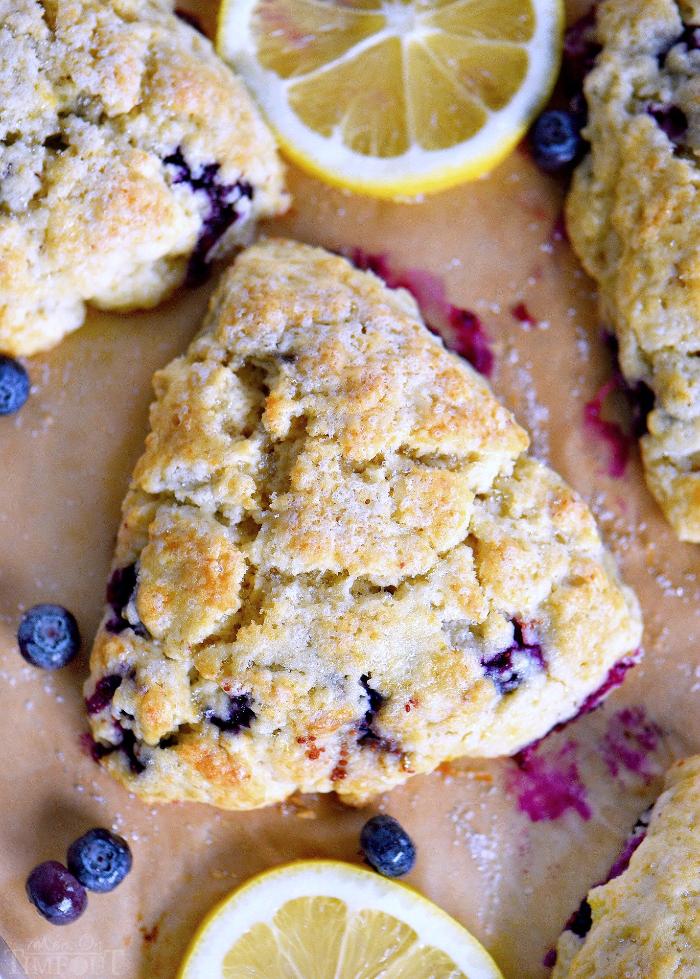 This Easy Lemon Blueberry Scones recipe is a delightful addition to any breakfast, brunch, or afternoon tea! Fresh blueberries and loads of lemon zest add an irresistible freshness to these easy to make scones. Serve with lemon curd and cream for an afternoon tea experience everyone will love! // Mom On Timeout #brunch #breakfast #tea #blueberries #blueberry #lemon #scones #scone #recipe #recipes lemon-blueberry-scones-recipe-with-lemon-curd