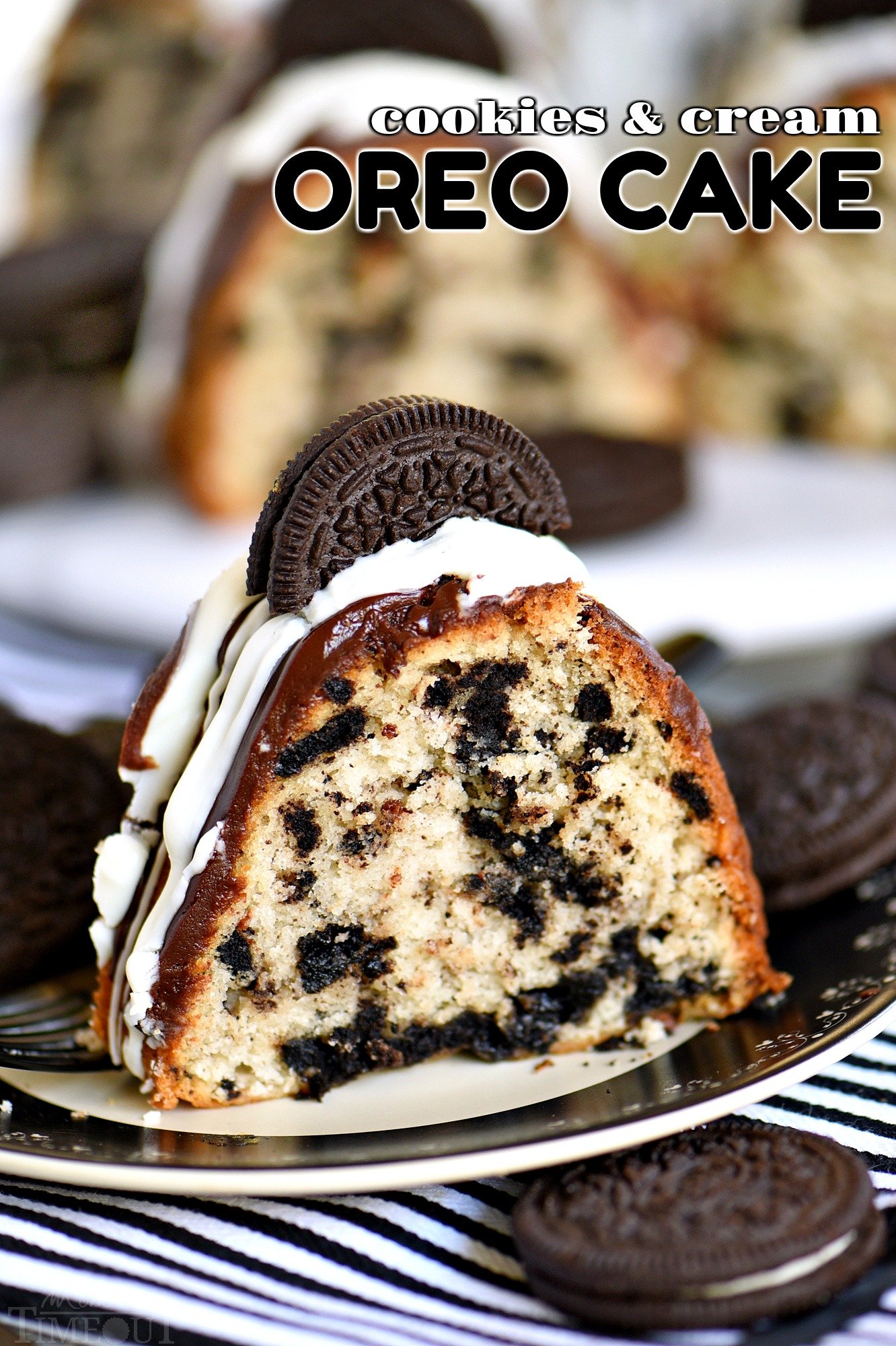 oreo-cake-recipe-cookies-and-cream cake sliced on plate with oreos and napkin