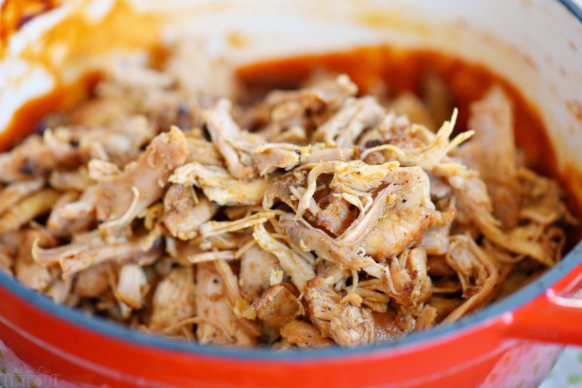 pulled chicken about to be stirred into a pot of root beer bbq sauce.