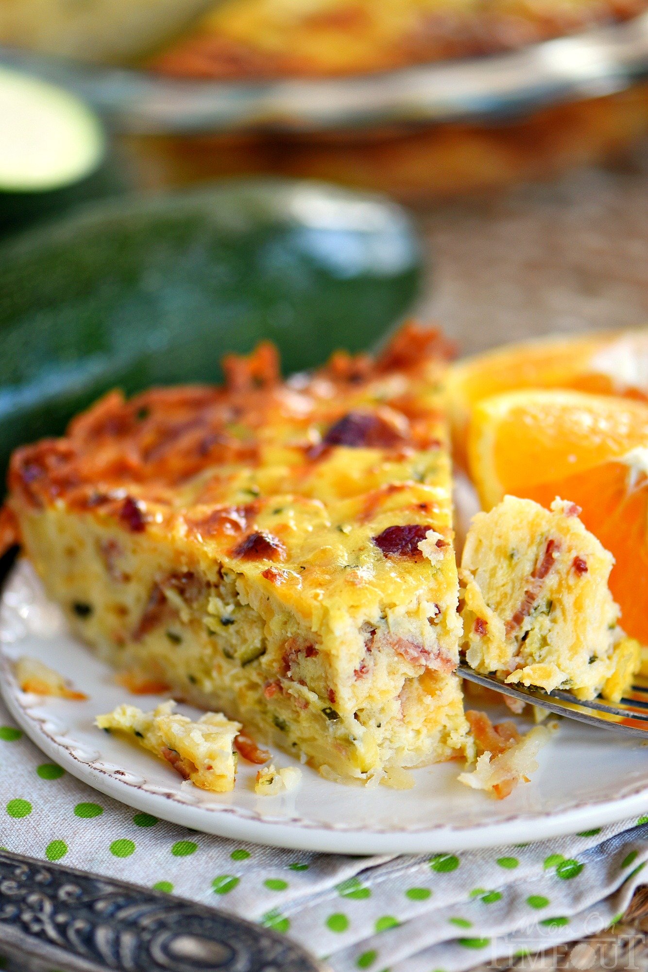 slice-zucchini-quiche-with-bacon-hash-brown-crust-recipe