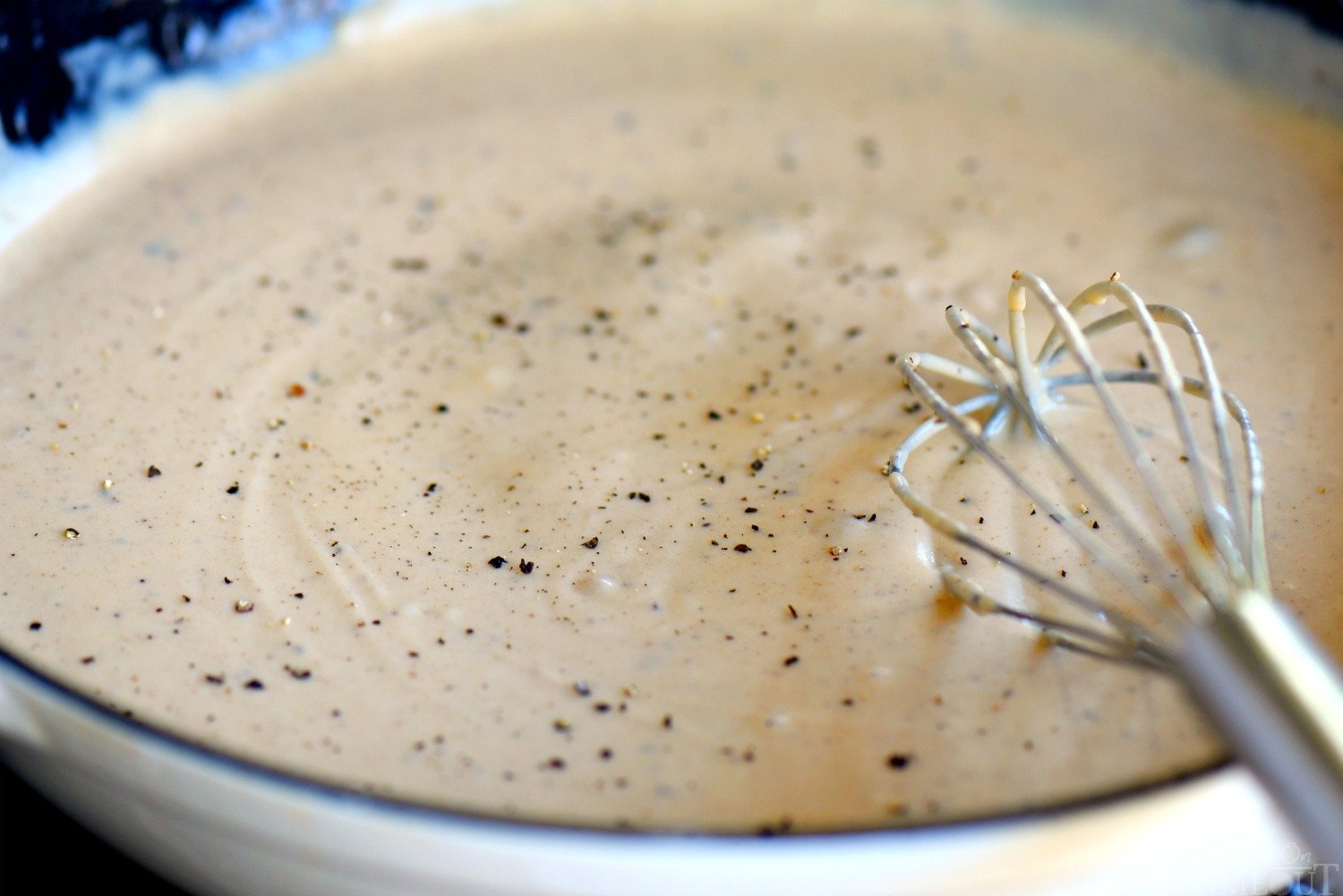 Creamy gravy made with the Best Chicken Fried Steak - so good! chicken-fried-steak-gravy