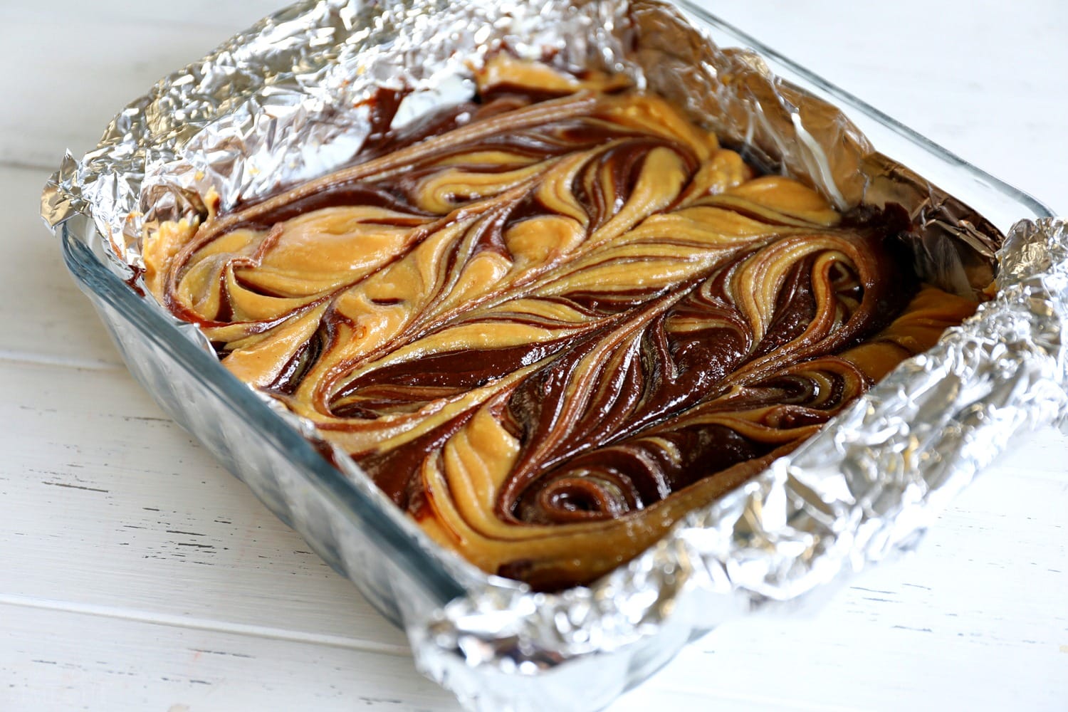 peanut-butter-cup-cheesecake-fudge-square-dish