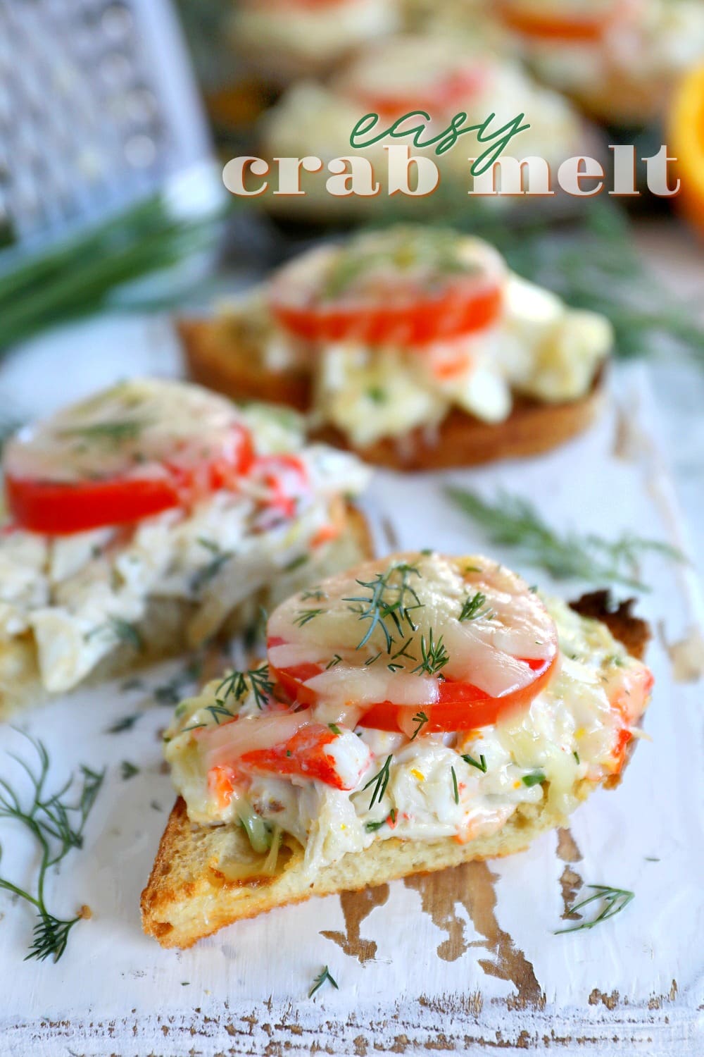 Easy Crab Melts are perfect for entertaining! Sourdough bread is topped with fresh crab, herbs, tomato and Gruyere cheese. Exceptionally delicious! // Mom On Timeout #crab #appetizer #recipe #recipes #ad crab-melt-recipe