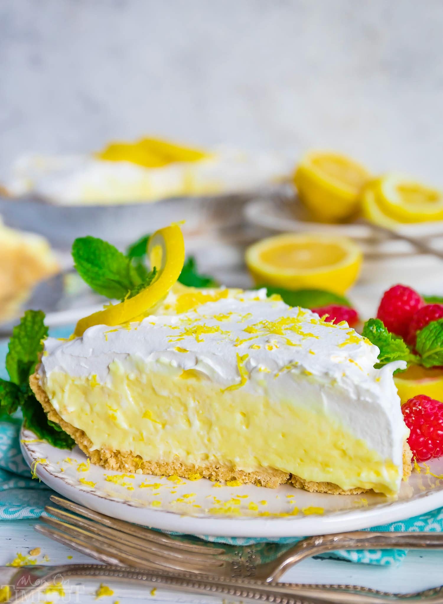 clean slice of creamy lemon pie served on a white plate.