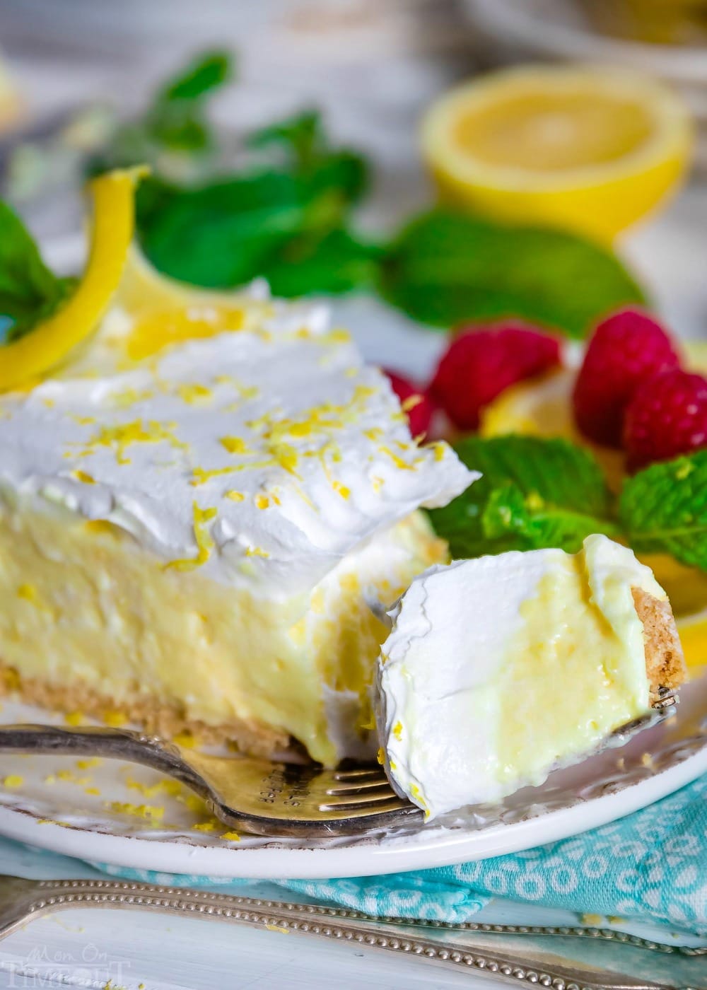 bite of lemon pie on a fork.