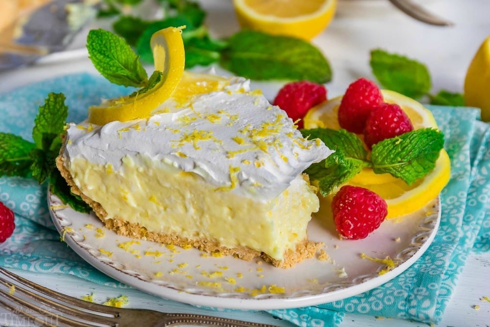 piece of no bake lemon pie with bite removed.