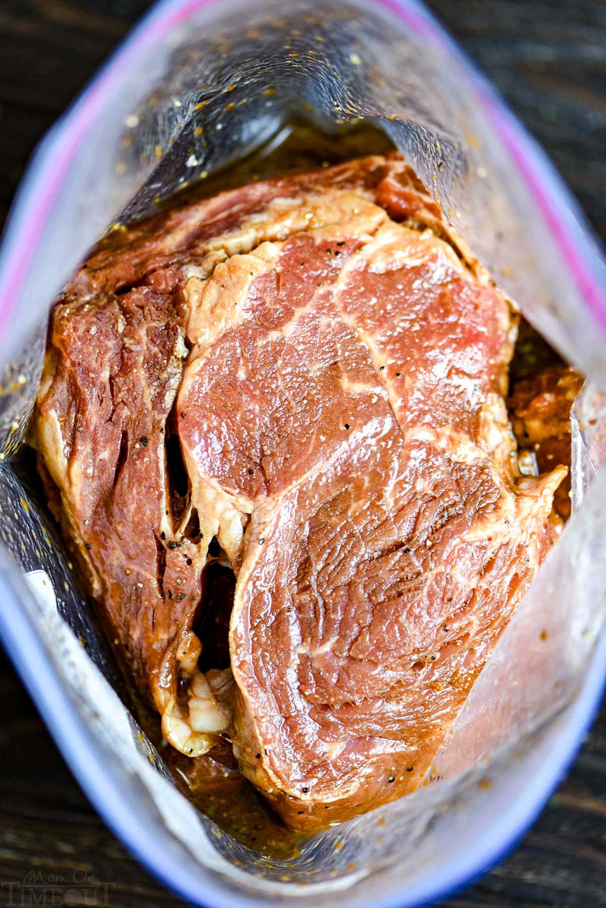 steak marinating in large ziploc bag ready to be grilled.