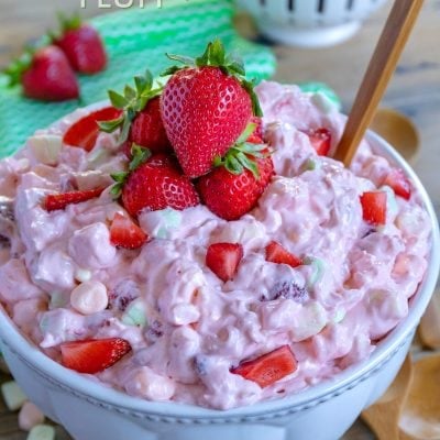 strawberry-fluff-in bowl topped with fresh strawberries in bowl