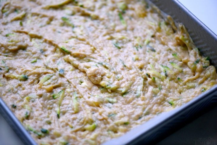 zucchini-banana-cake-batter-in-parchment-lined baking pan